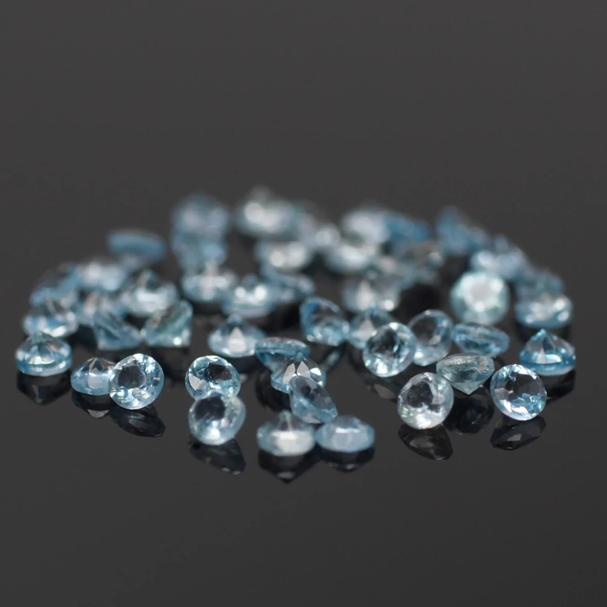 Aquamarine | natural, round-cut, blue color, accent stones