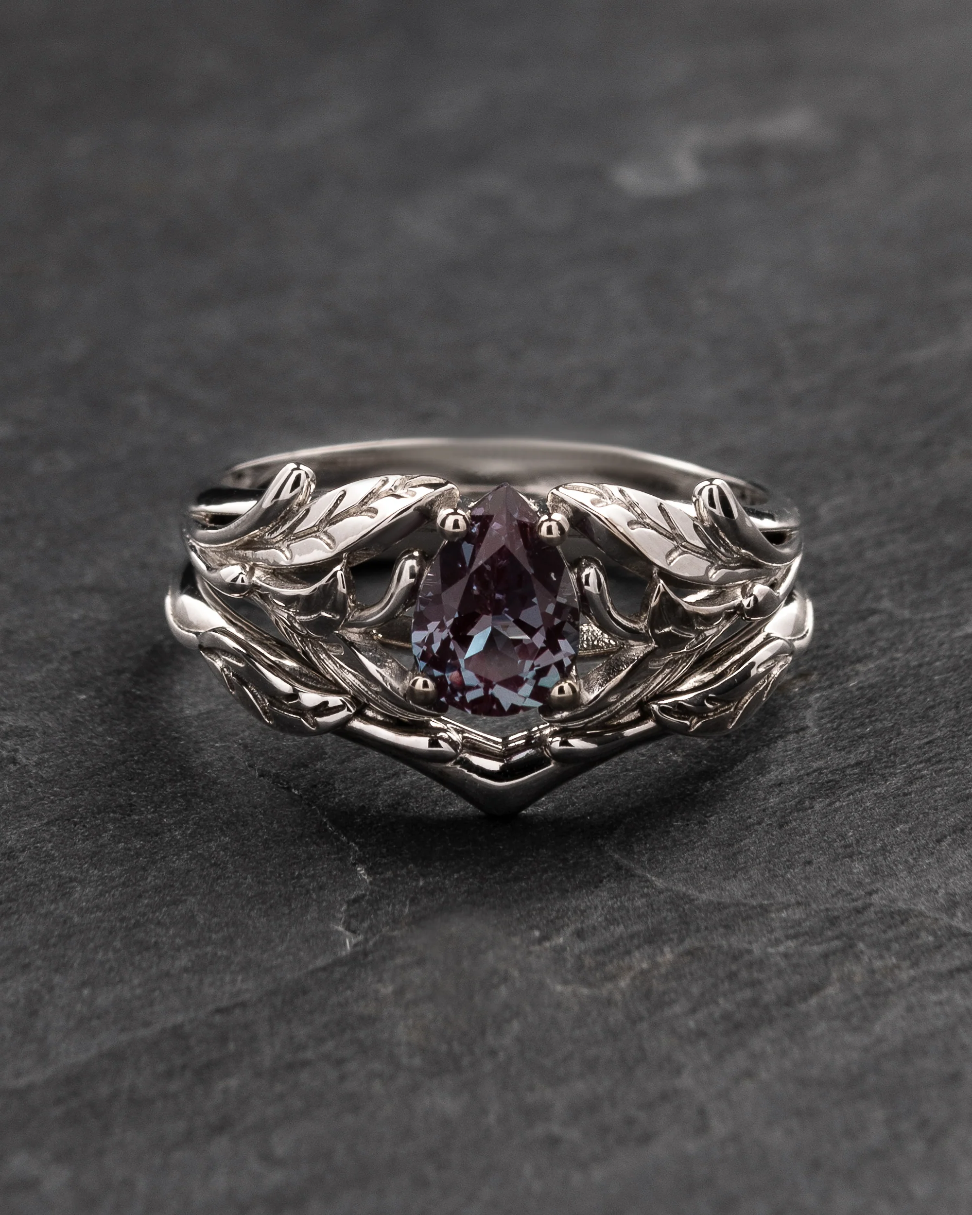 Colour changing alexandrite engagement ring with a matching wedding band / Wisteria