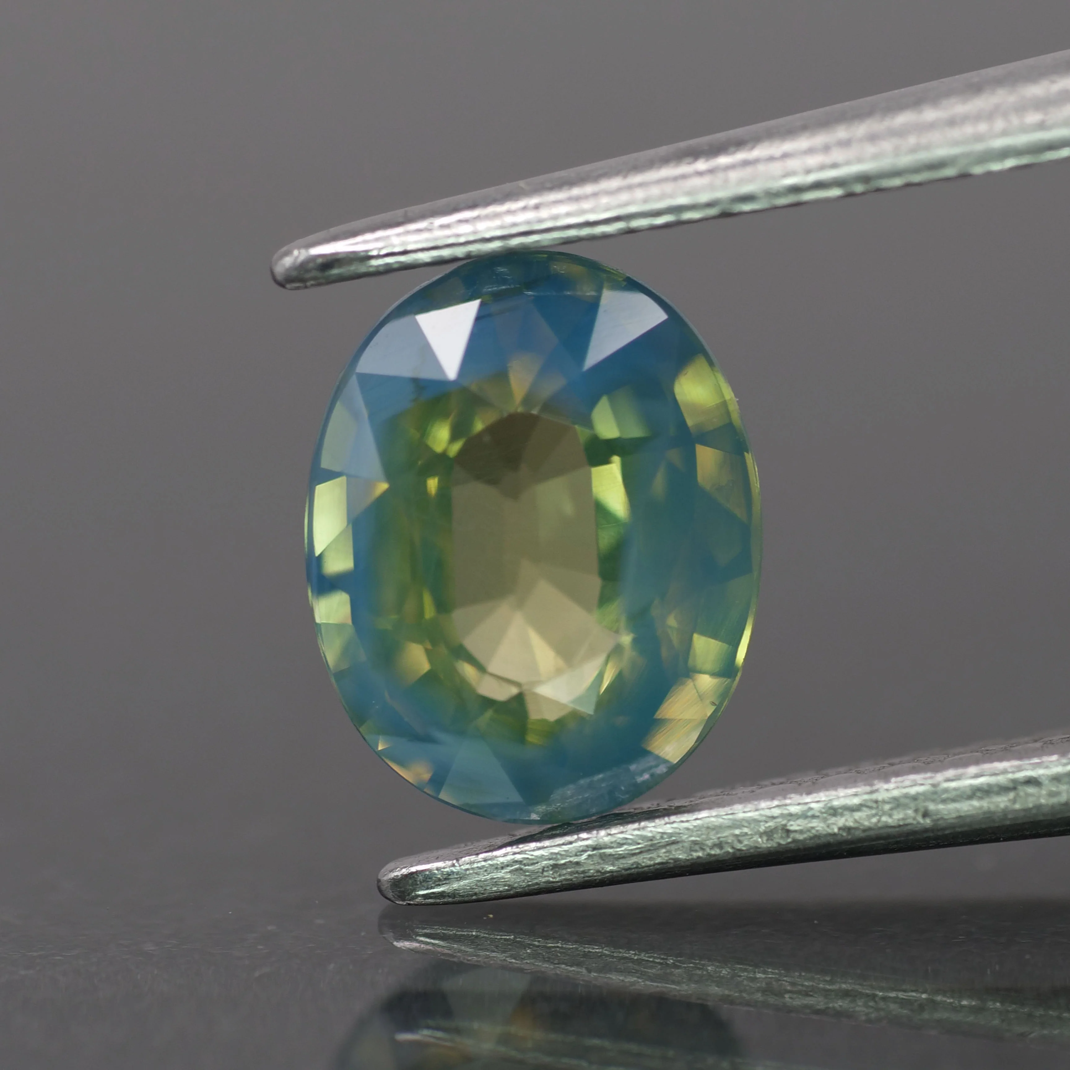 Opalescent Sapphire | CGL Certified | natural, mermaid's whisper green color, oval-cut, 7.2x5.75mm, 1.2ct