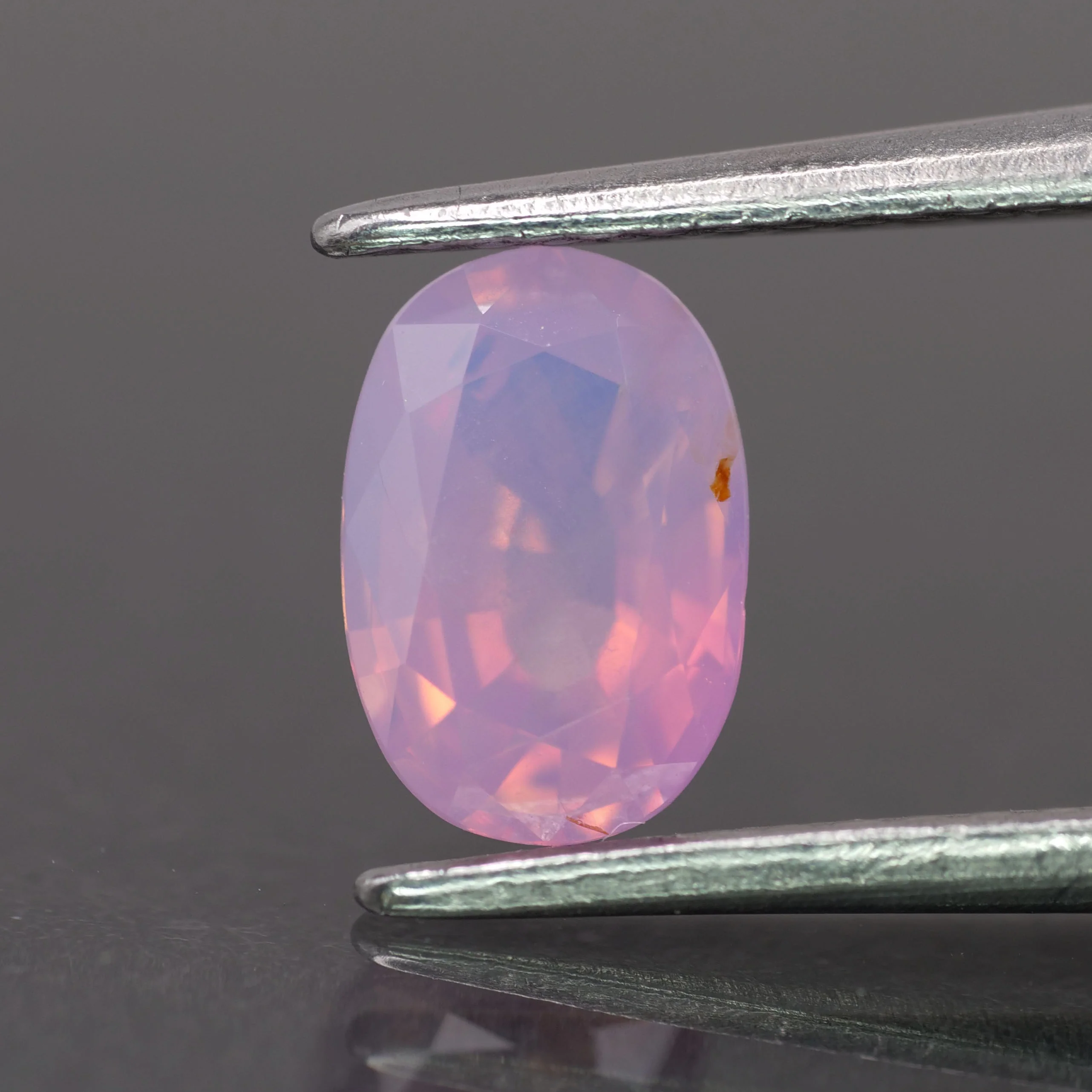 Opalescent sapphire | natural, pink color, oval-cut, *7x5mm, 0.9ct