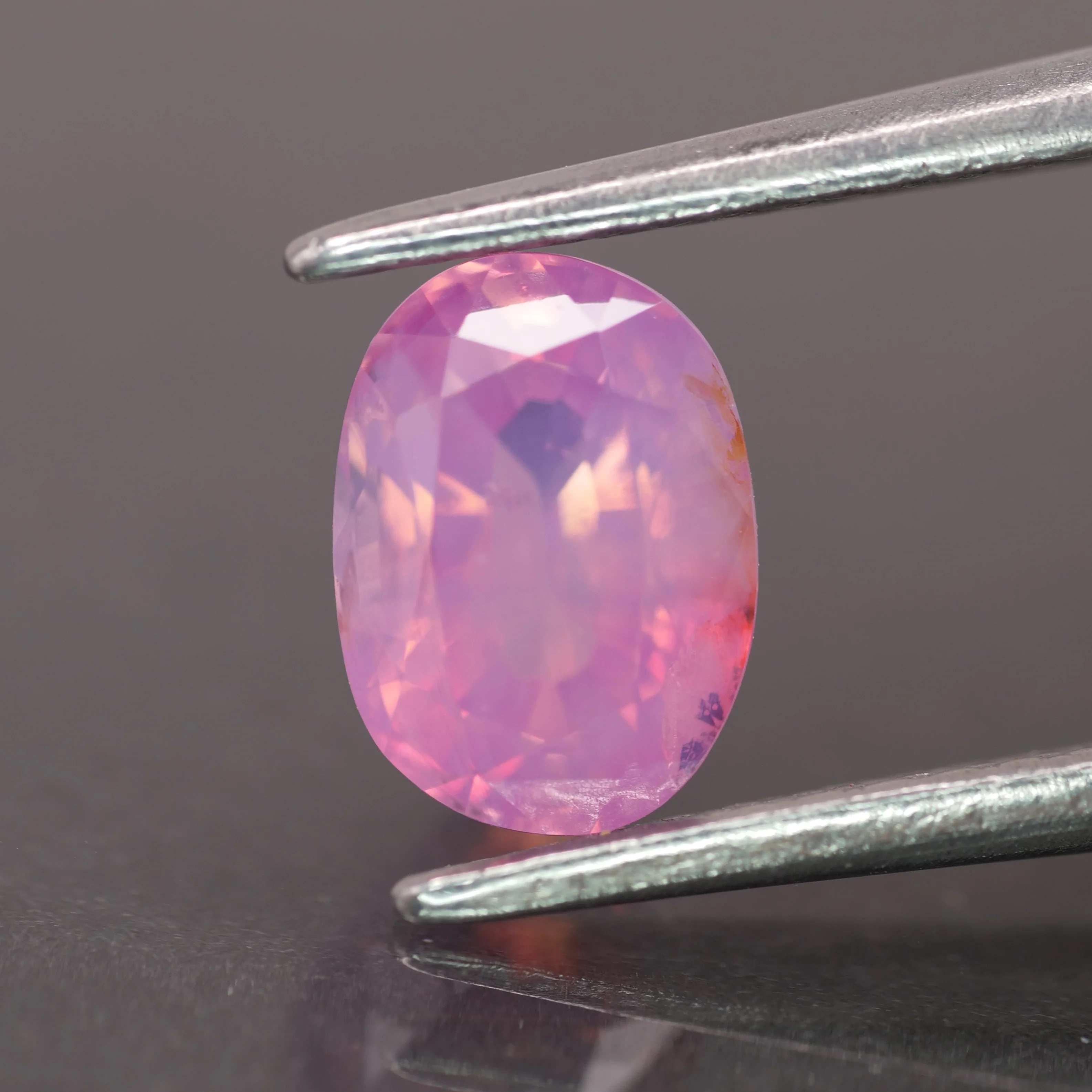 Opalescent sapphire | natural, pink color, oval-cut, *7x5mm, 1.3ct