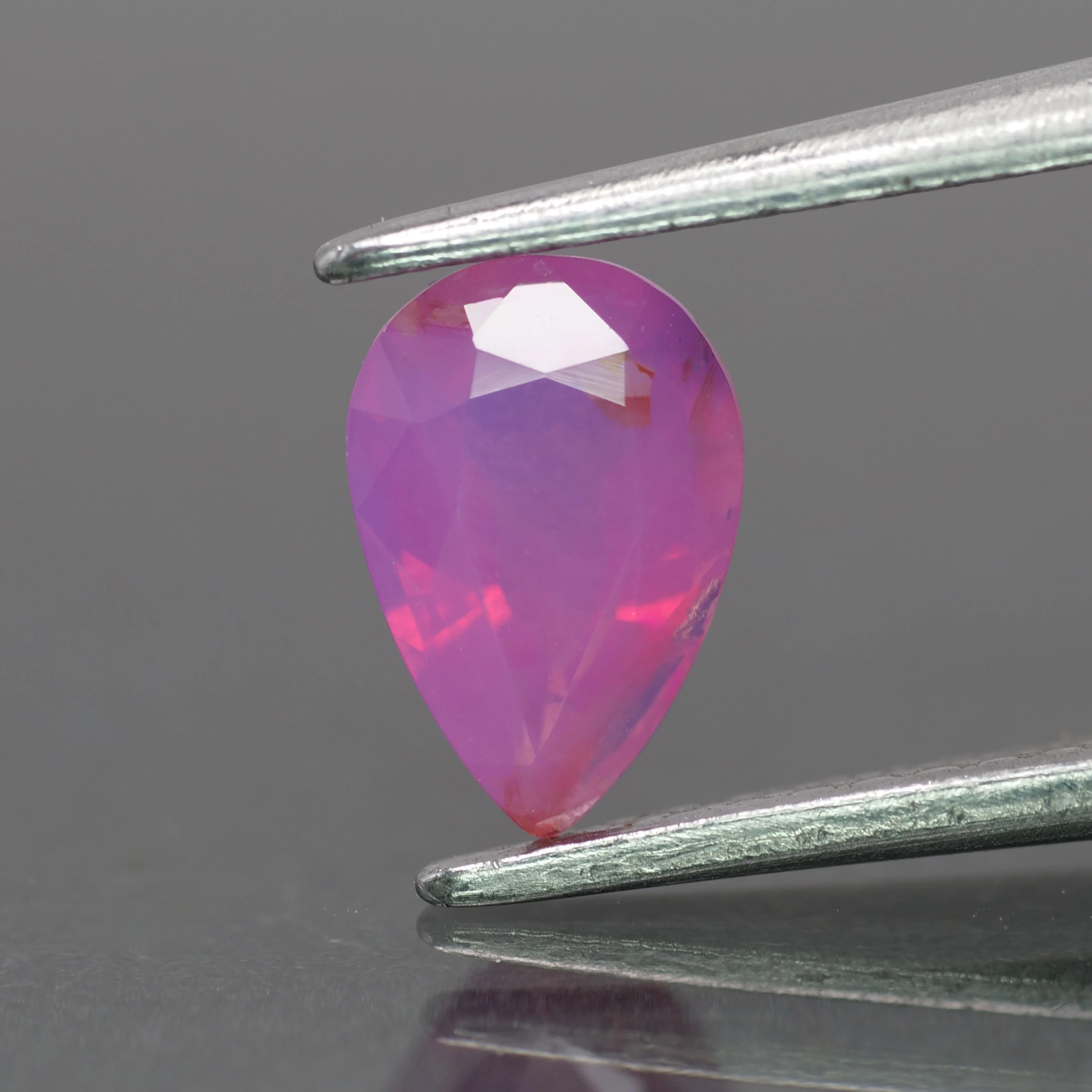 Opalescent sapphire | natural, pink color, pear-cut, *7.5x5mm, 0.9ct