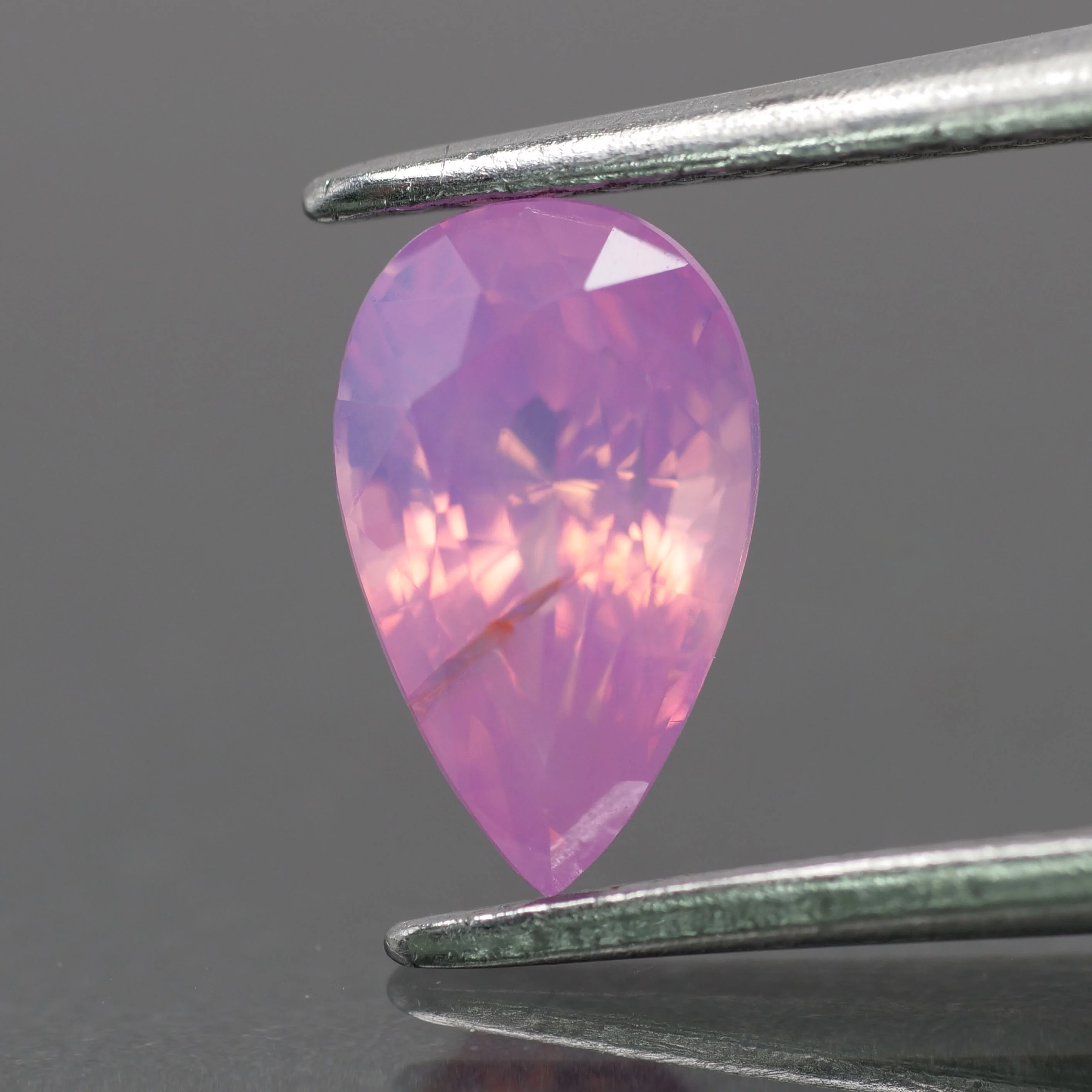 Opalescent sapphire | natural, pink color, pear-cut, *8x5mm, 1.3ct