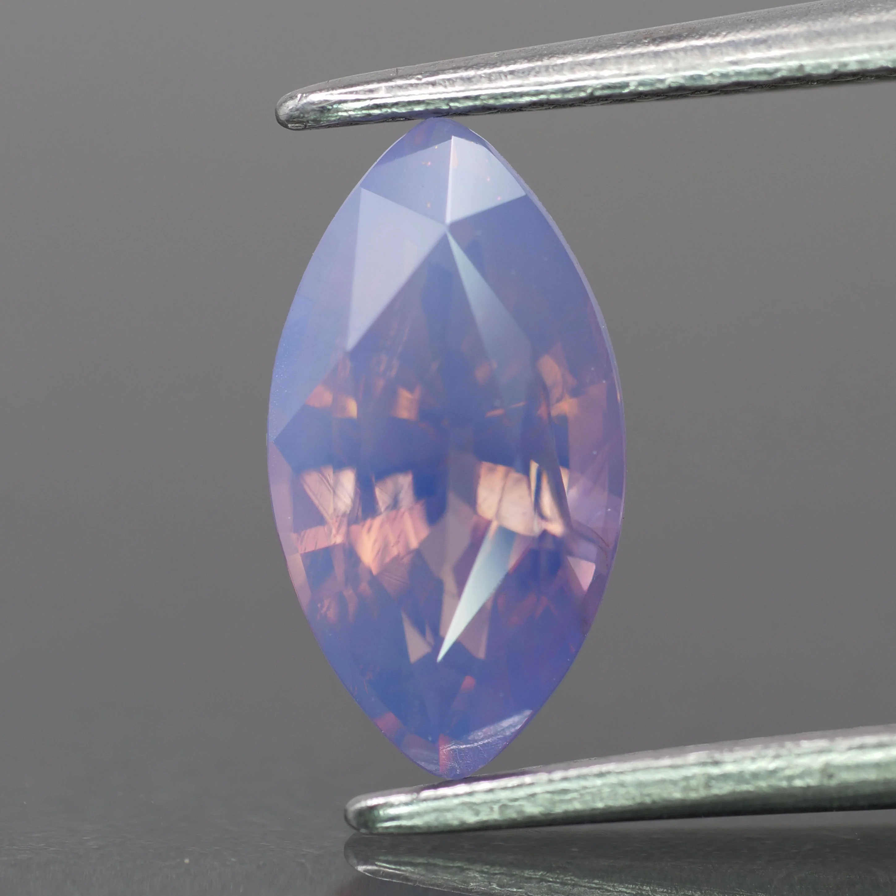 Opalescent sapphire | natural, pinkish purple color, marquise-cut, *9.5x5mm, 1.5ct