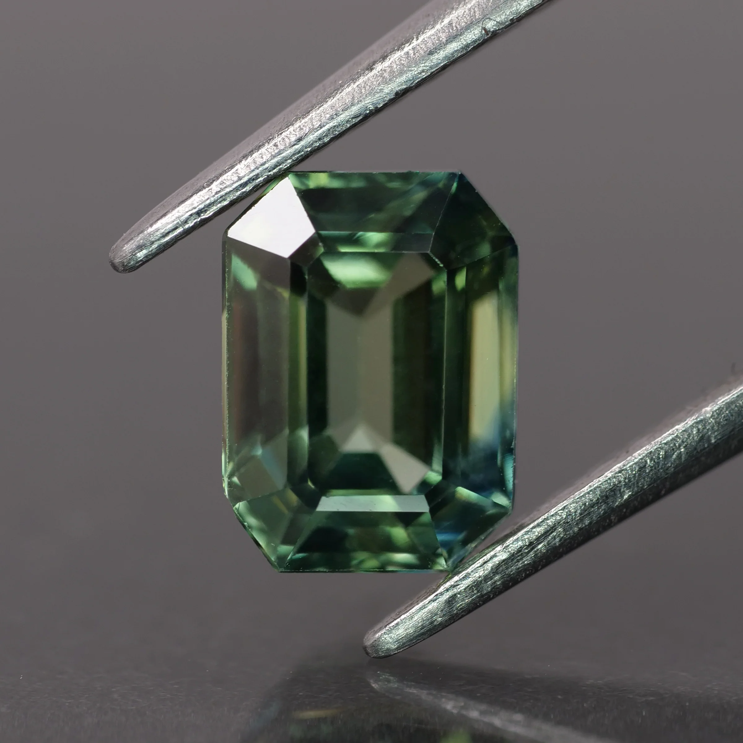 Sapphire | IGI certified | natural, greenish blue color, emerald-cut, *7x5mm, 1.49ct