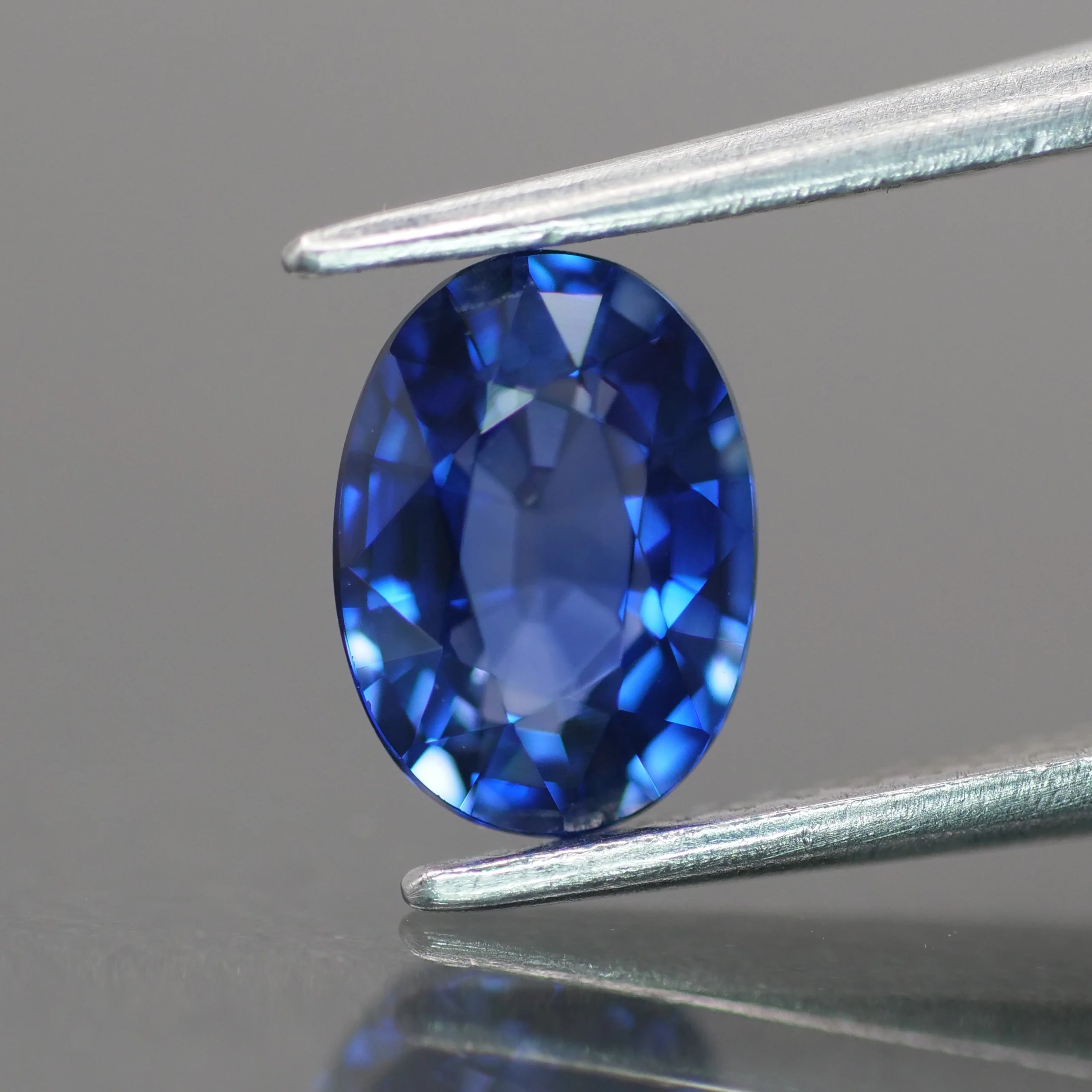 Sapphire | IGI certified | natural, diffusion-treated, blue color, oval-cut, *7.5x5.5mm, 1.25ct