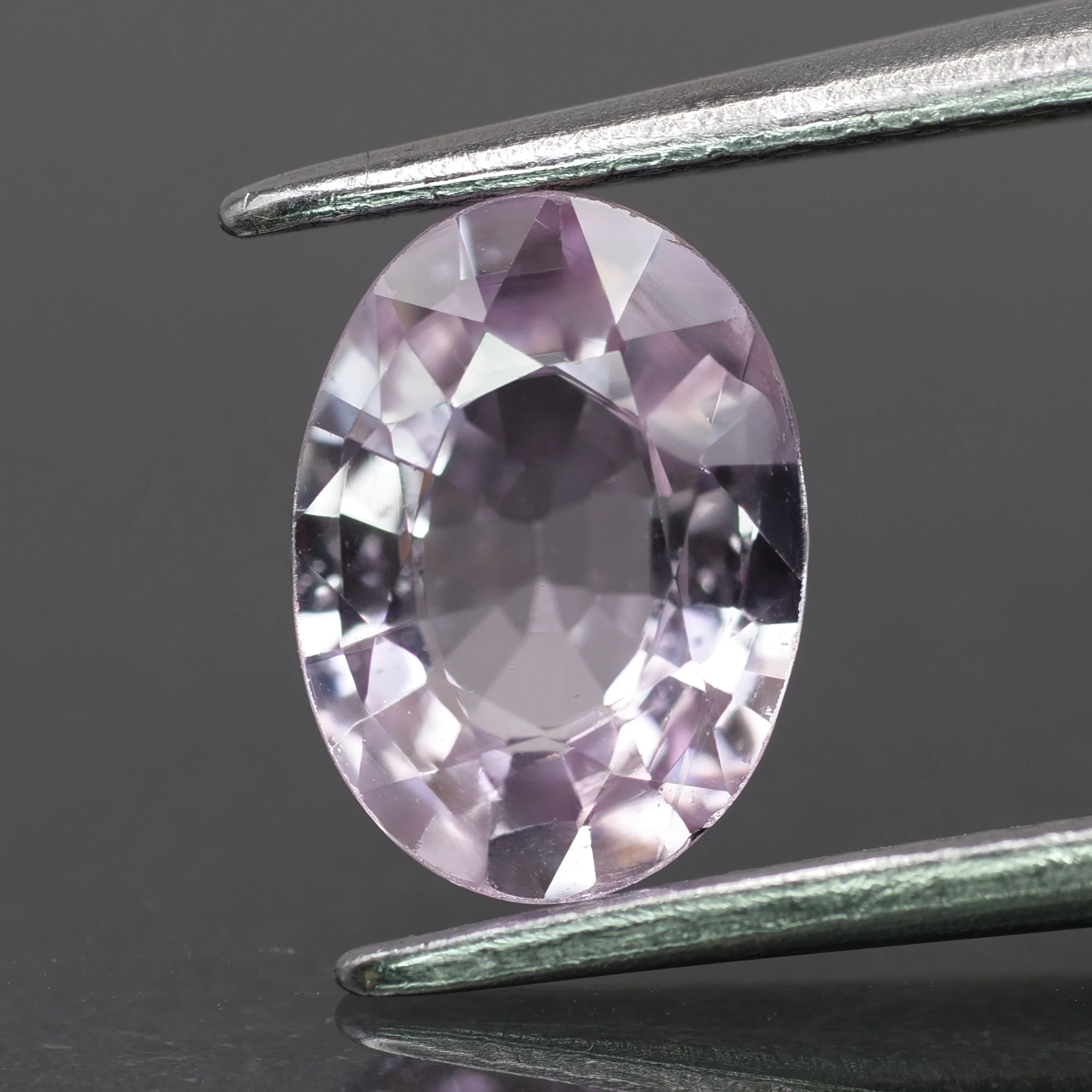 Sapphire | IGI certified | natural, purplish pink color, oval-cut, *8x6mm, 1.34ct
