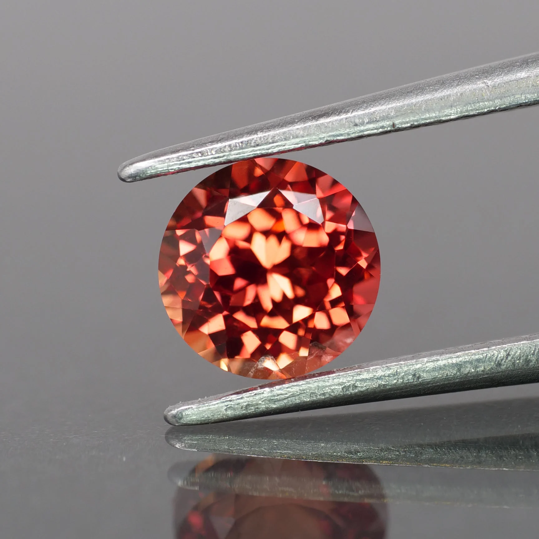 Sapphire | lab-grown, orange padparadscha color, round-cut, 6mm, 1.25ct