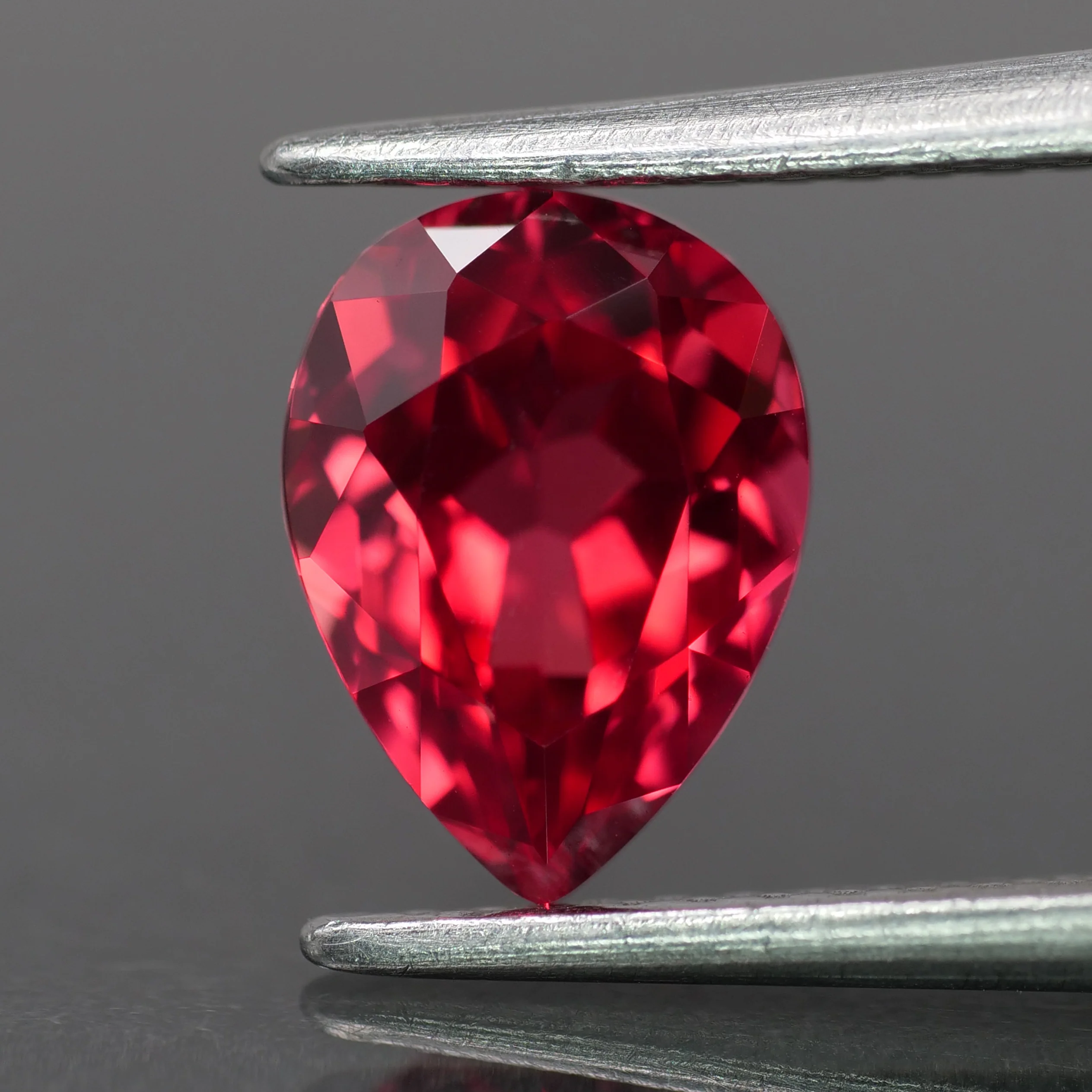 Sapphire | lab-grown, raspberry red color, pear-cut, 8x6mm, 1.5ct