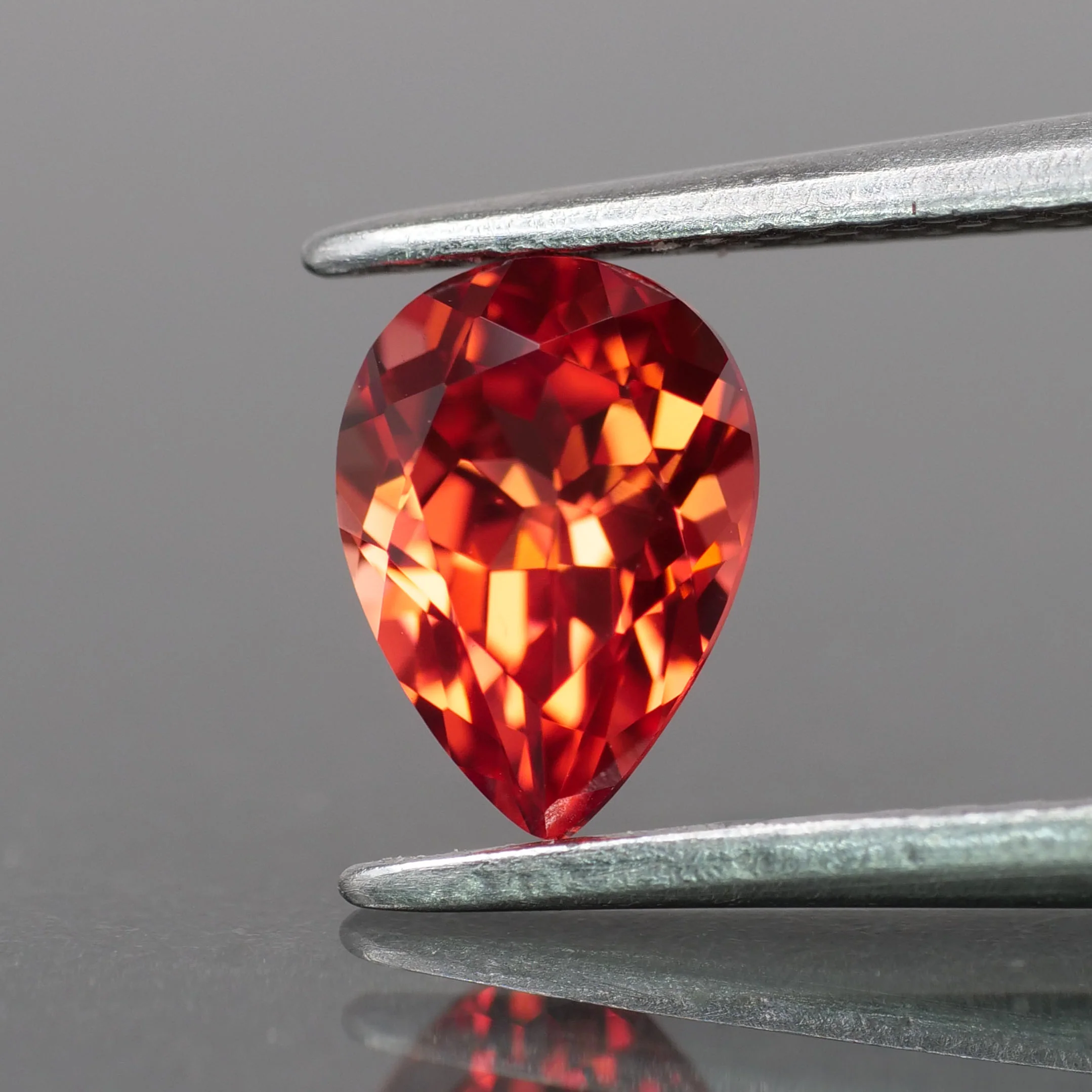 Sapphire | lab-grown, red padparadscha color, pear-cut, 7x5mm, 1ct