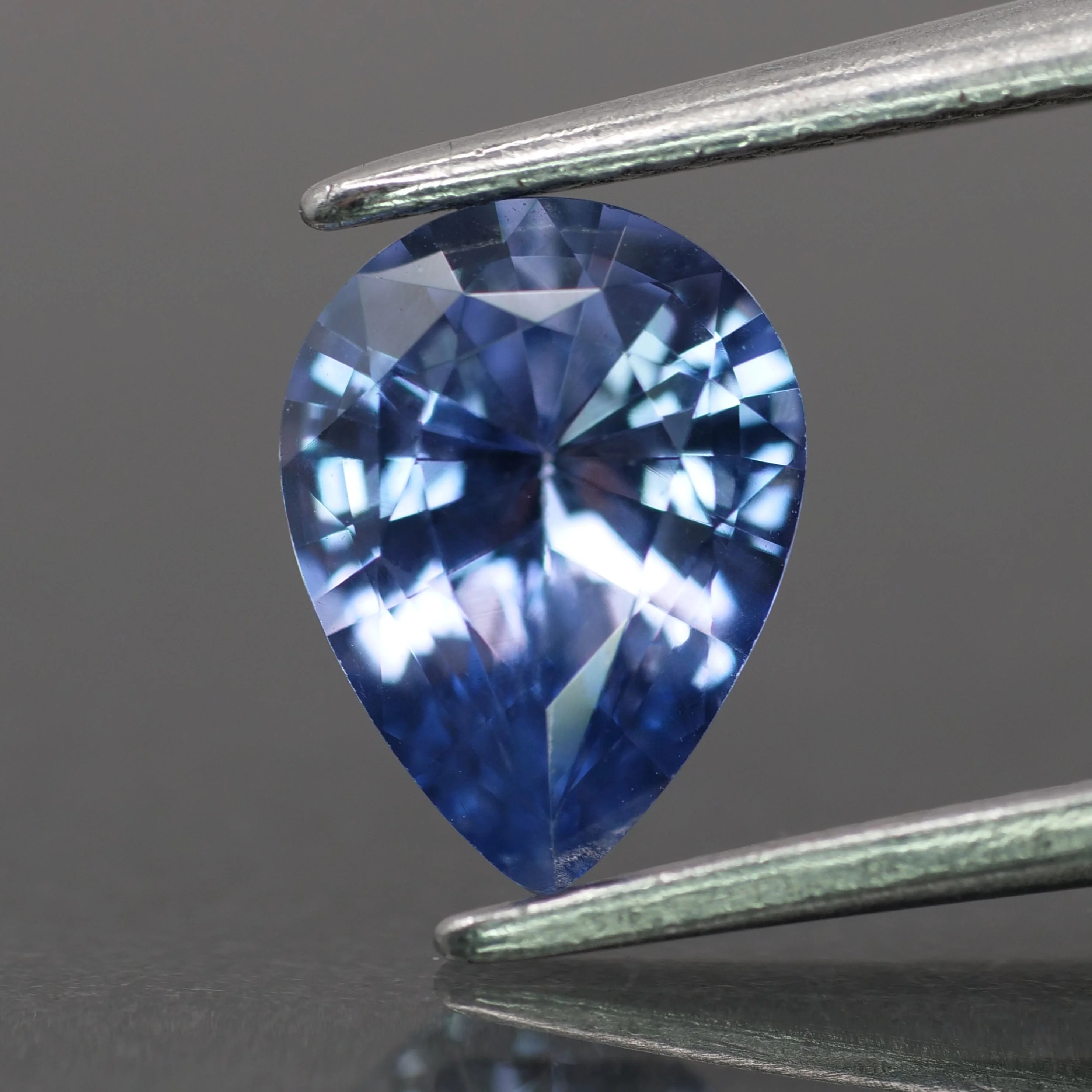 Sapphire | natural, purplish blue color, pear-cut, 8x6mm, 1ct