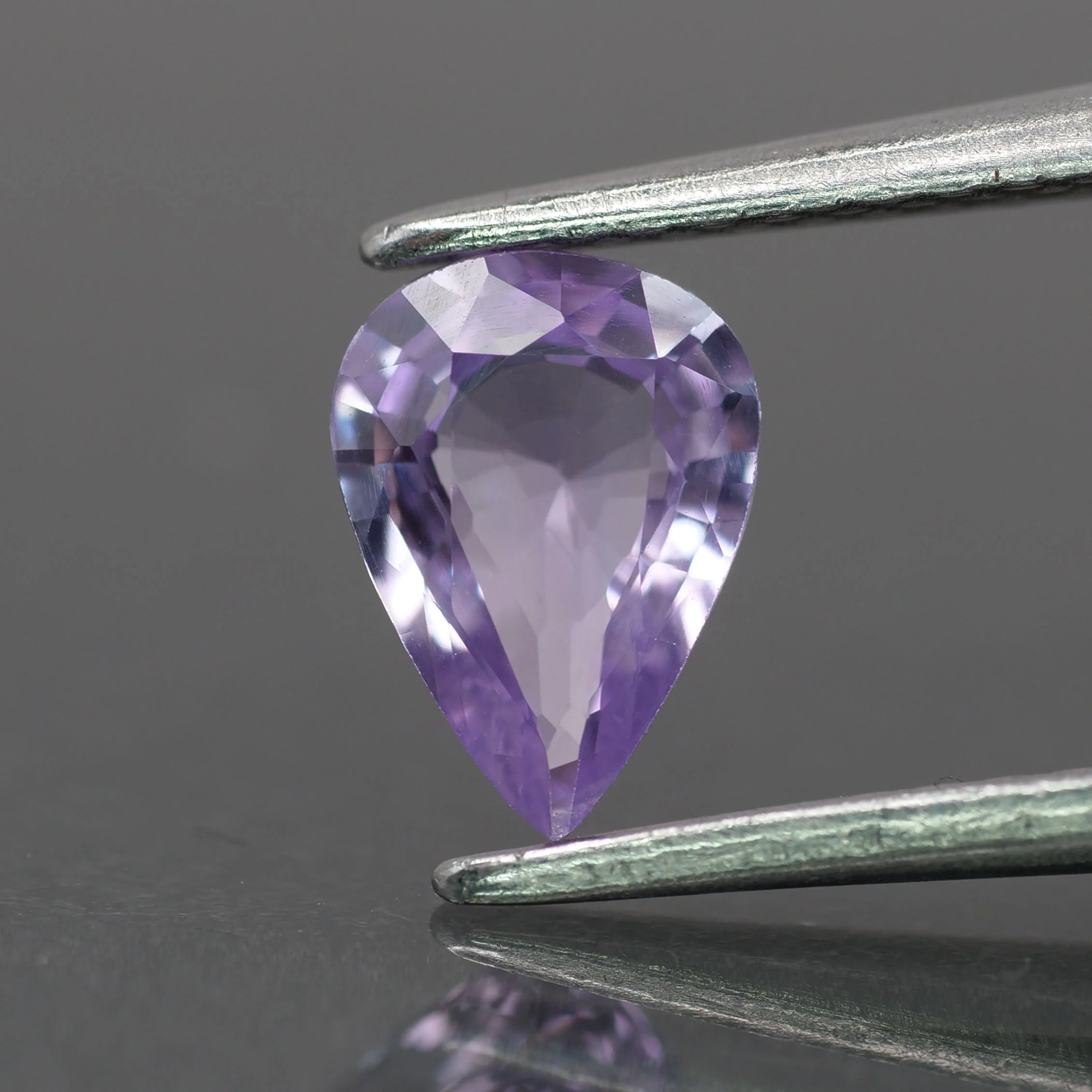 Sapphire | natural, light purple color, pear-cut, 7x5mm, 0.6ct