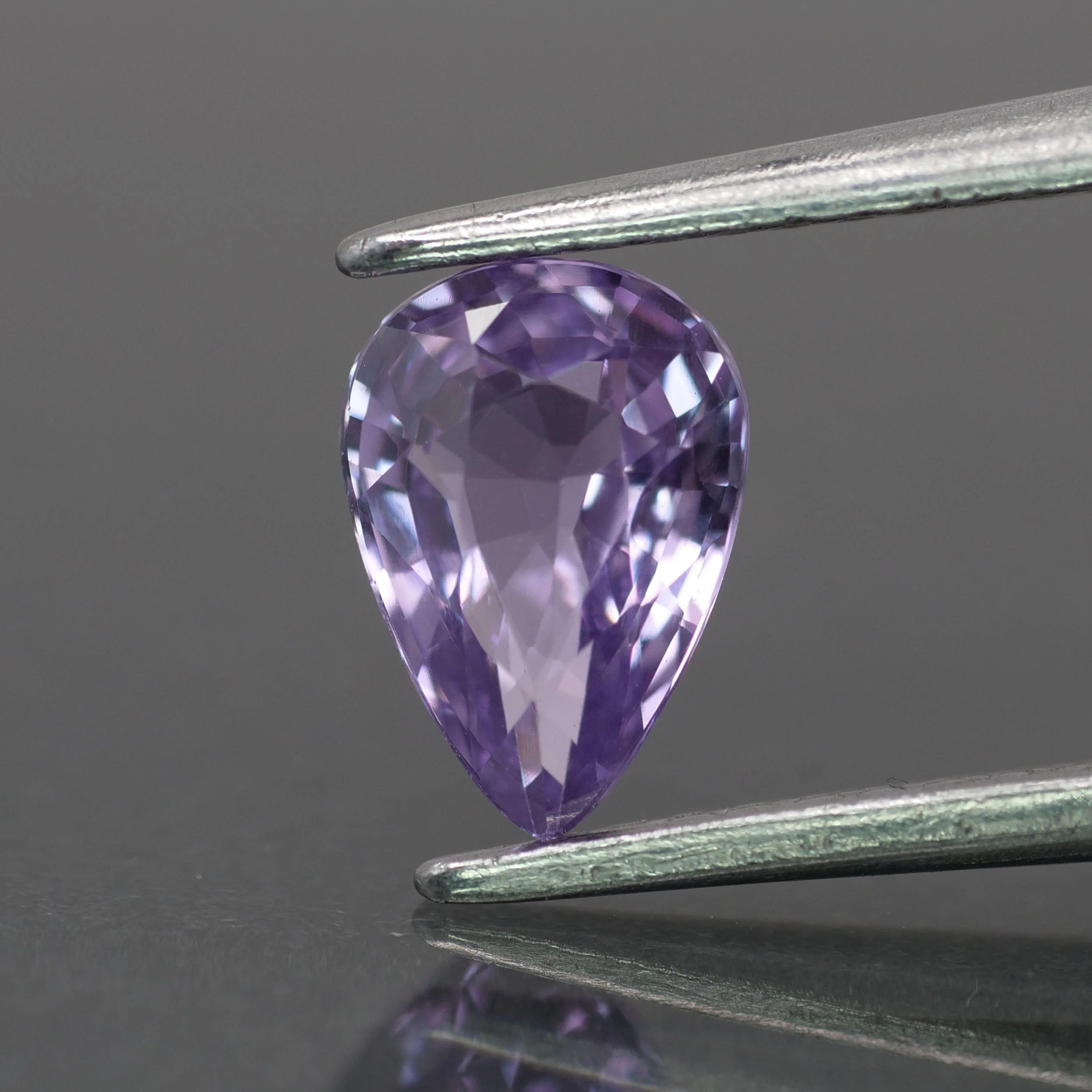 Sapphire | natural, light purple color, pear-cut, 7x5mm, 0.9ct