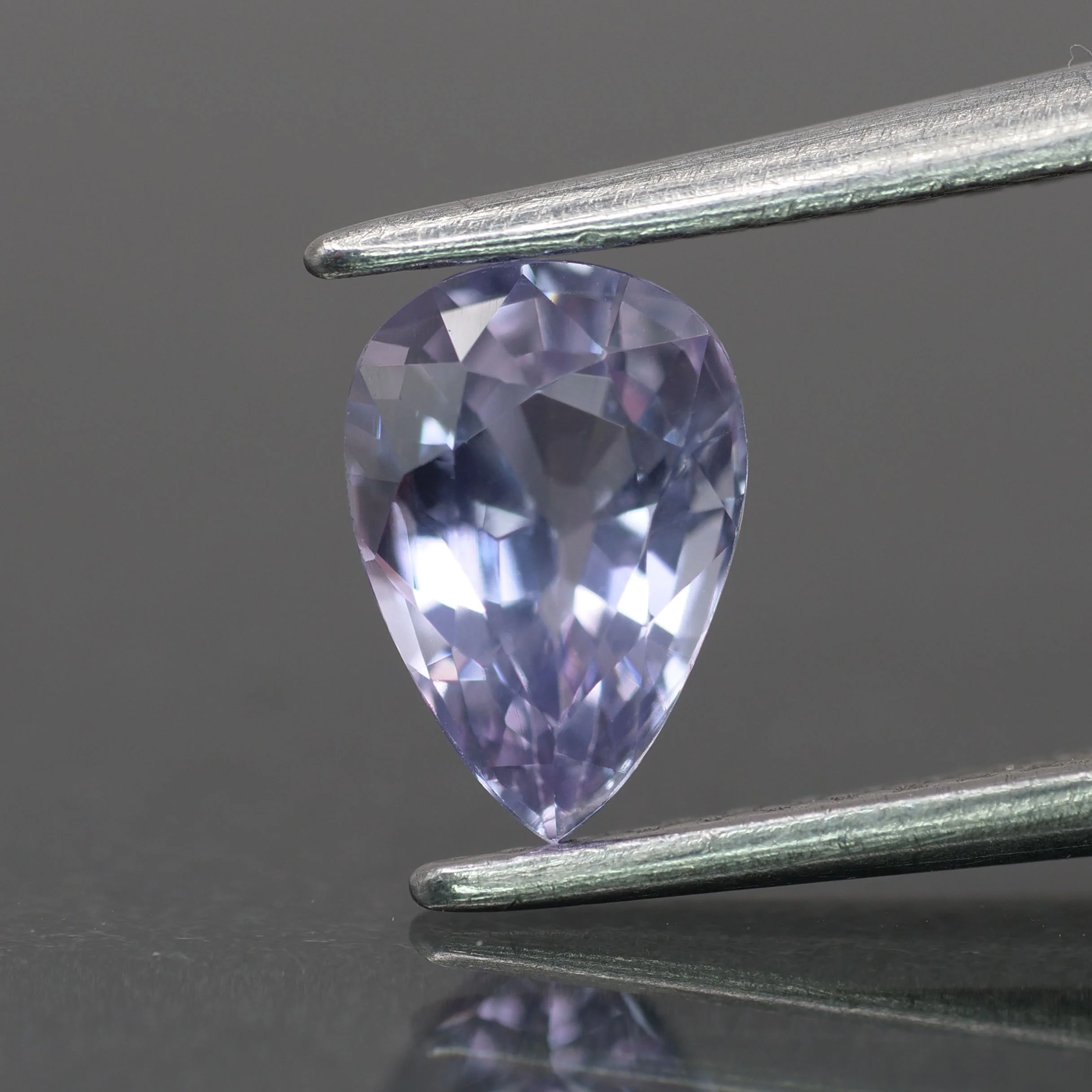 Sapphire | natural, light purple color, pear-cut, 7x5mm, 0.9ct