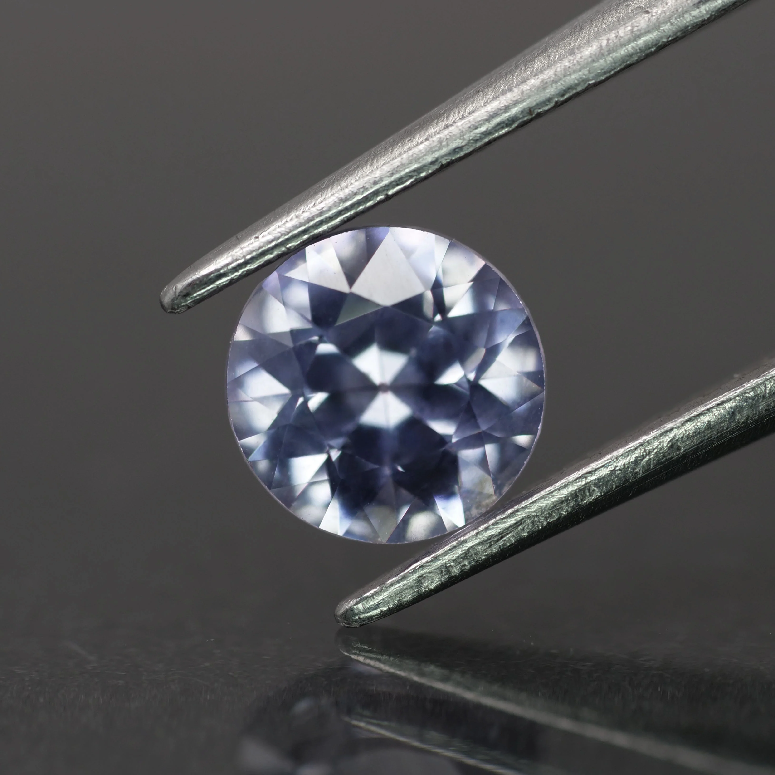 Sapphire | natural, light purple color, round-cut, *6mm, 0.8ct
