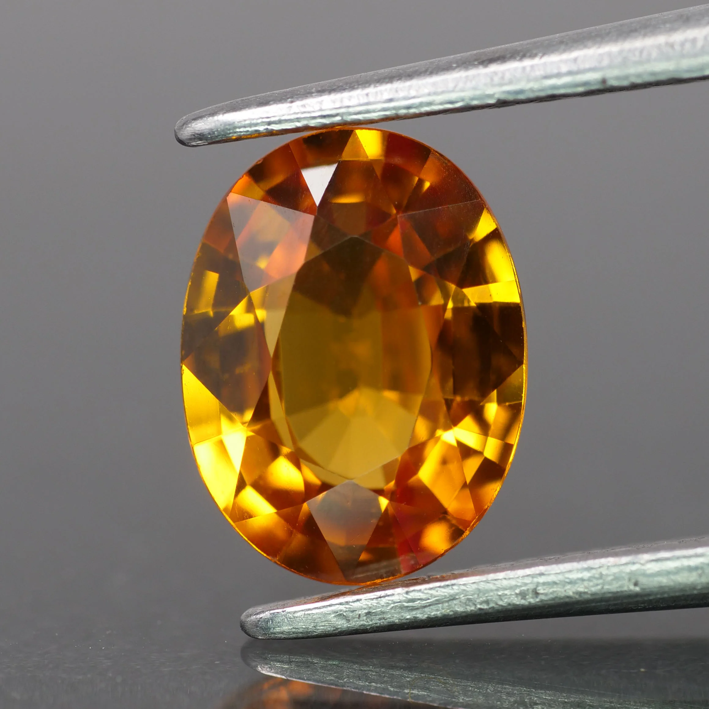Sapphire | natural, orange color, oval-cut, 8x6mm, 1.5ct