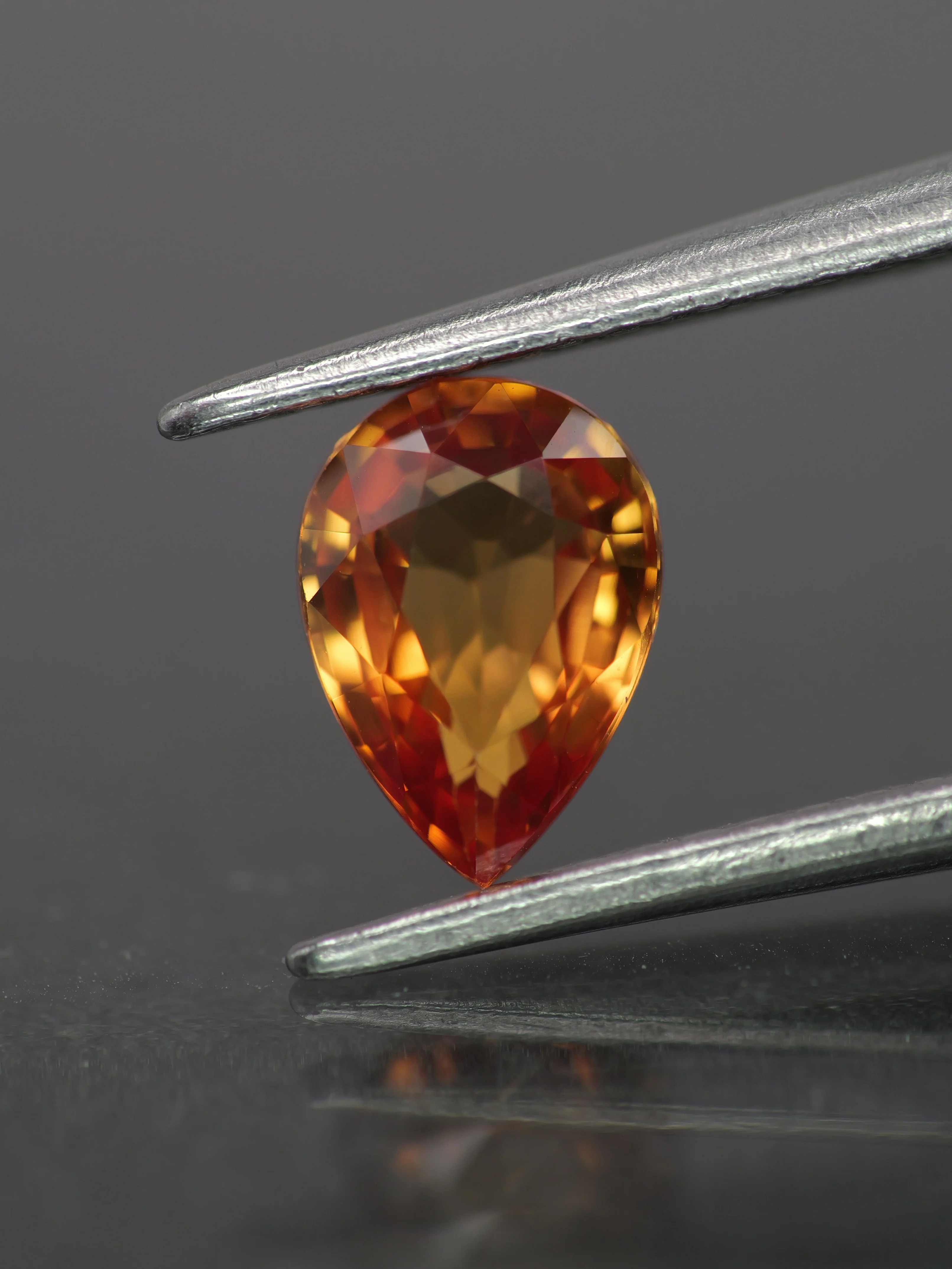 Sapphire | natural, orange color, pear-cut, 7x5mm, 0.8ct