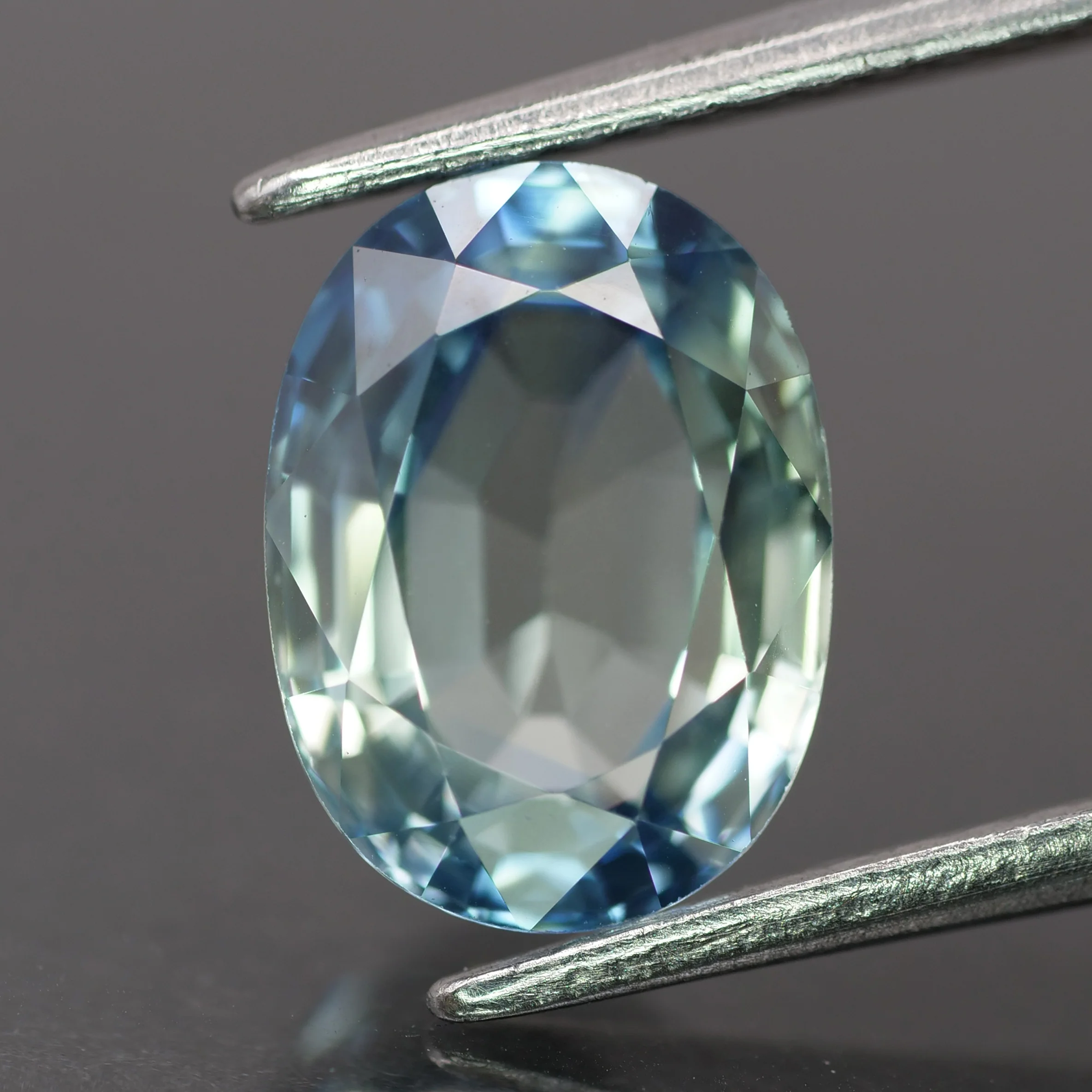 Sapphire | natural, pastel greenish blue color, oval-cut, *9x7mm, 2.7ct