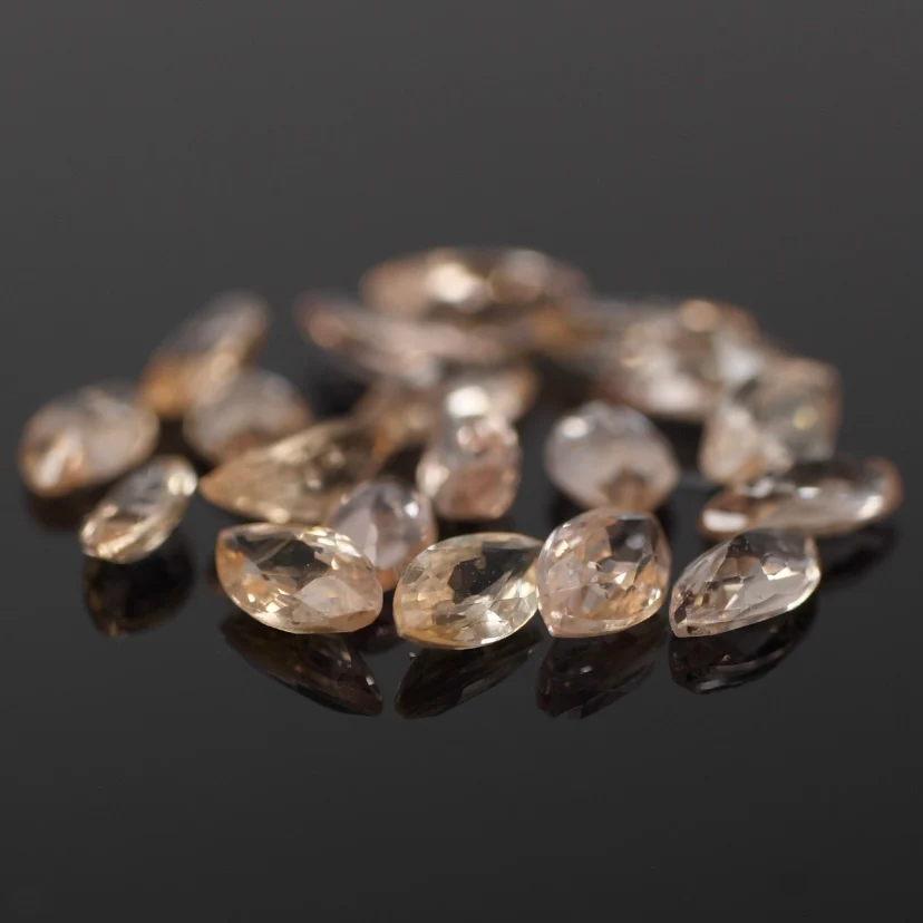 Sapphire | natural, peach color, marquise-cut, accent stones