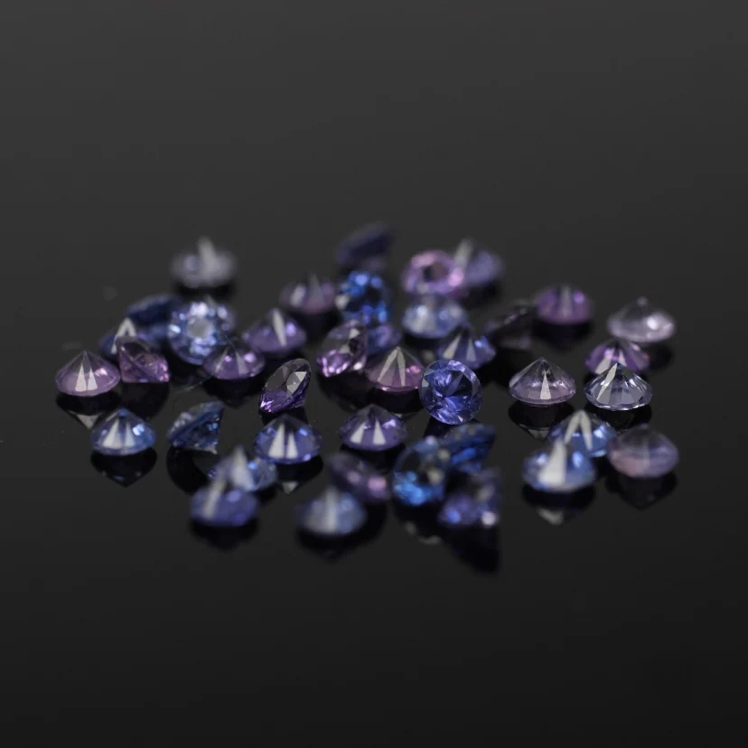 Sapphire | natural, purple color mix, round-cut, accent stones