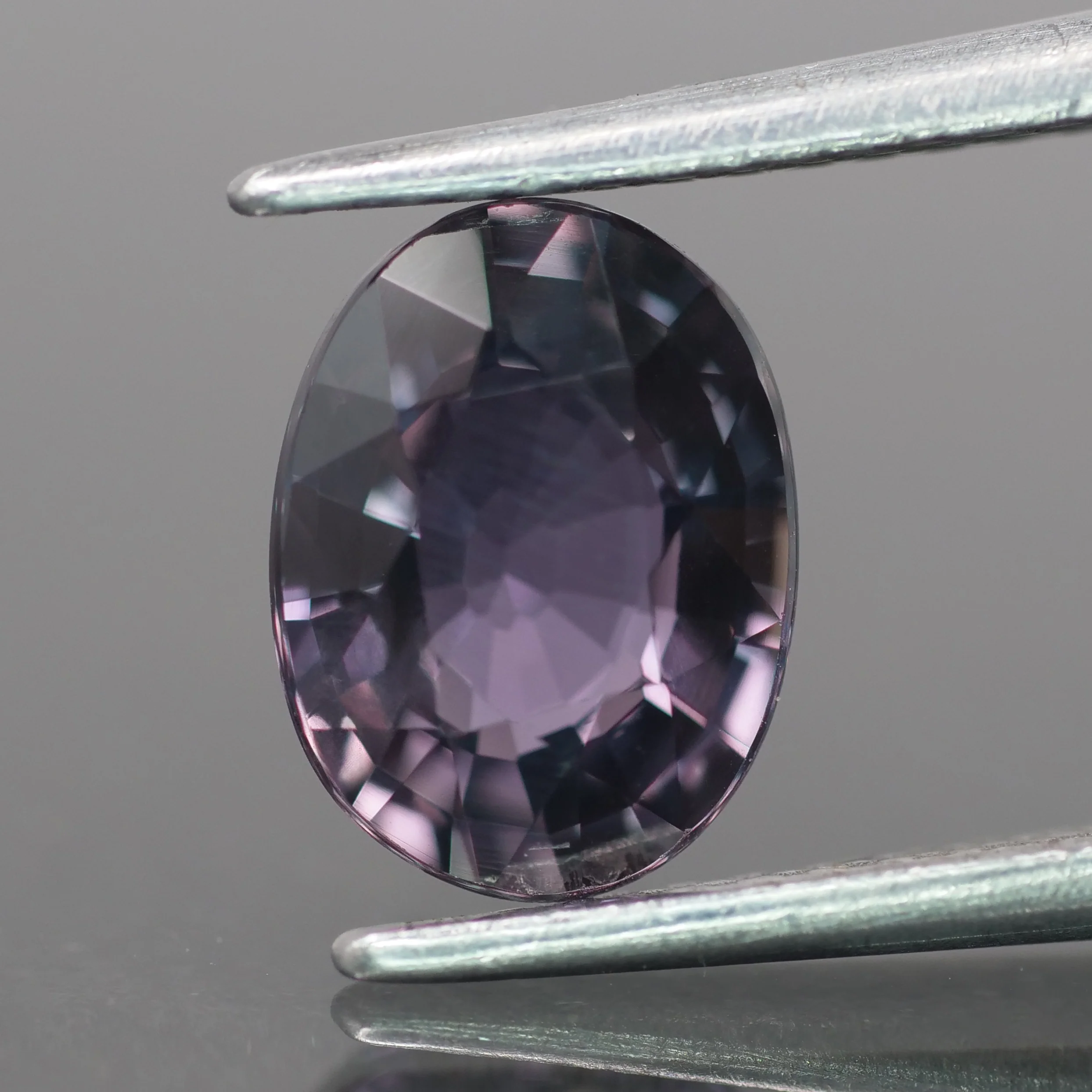 Sapphire | natural, color changing, oval-cut, *8x6mm, 1.5ct
