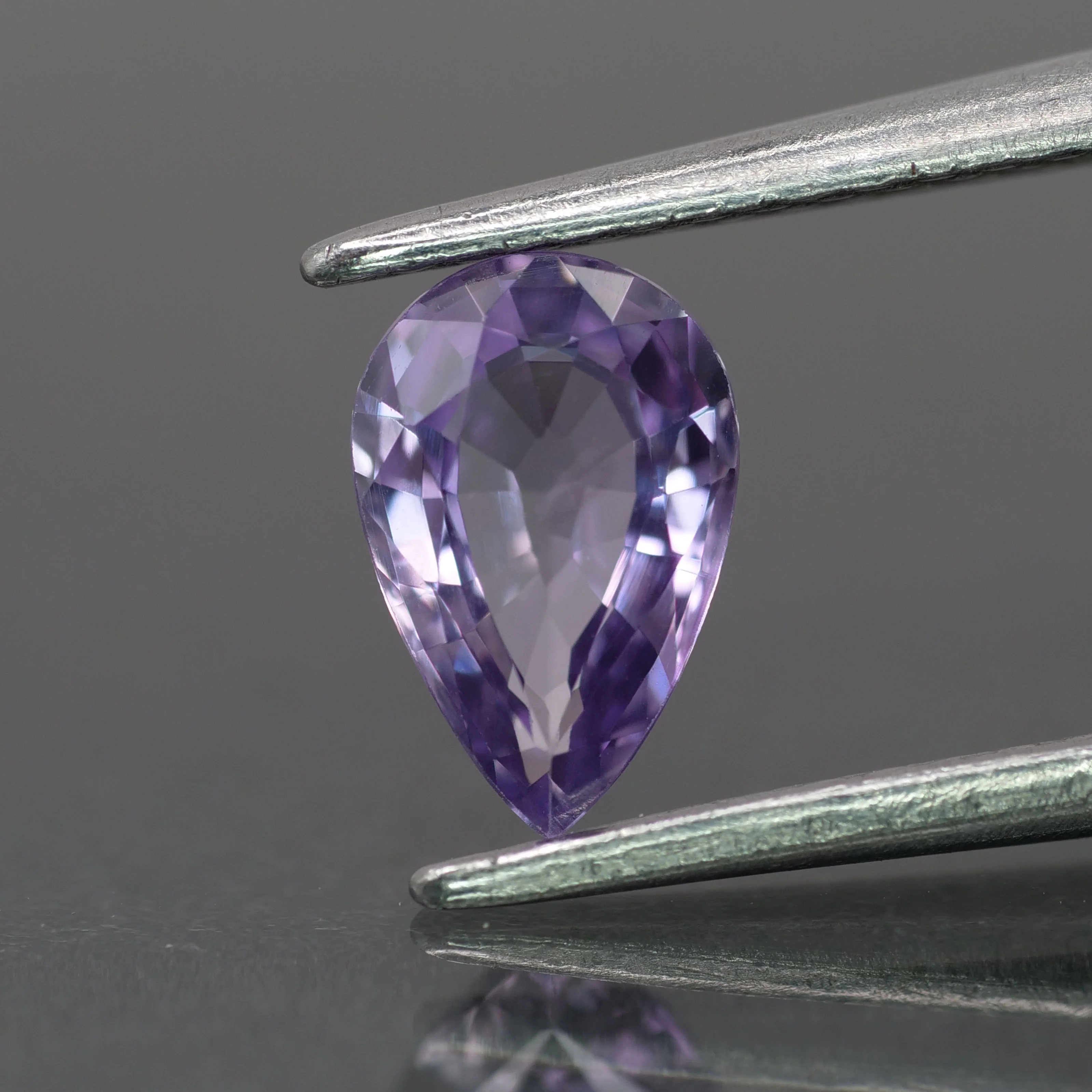 Sapphire | natural, purple color, pear-cut, 7x5mm, 0.7ct