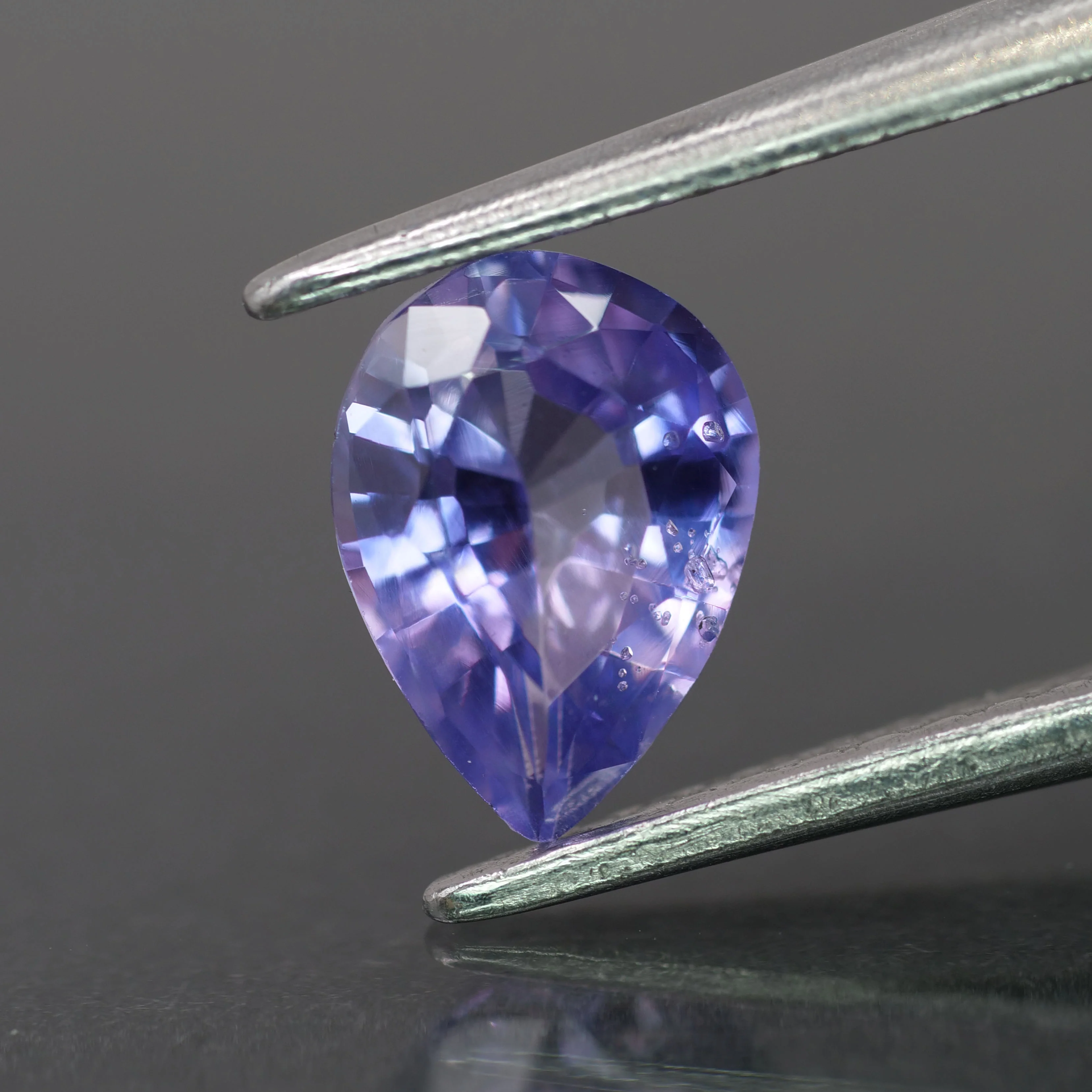 Sapphire | natural, purple color, pear-cut, 7x5mm, 0.8ct