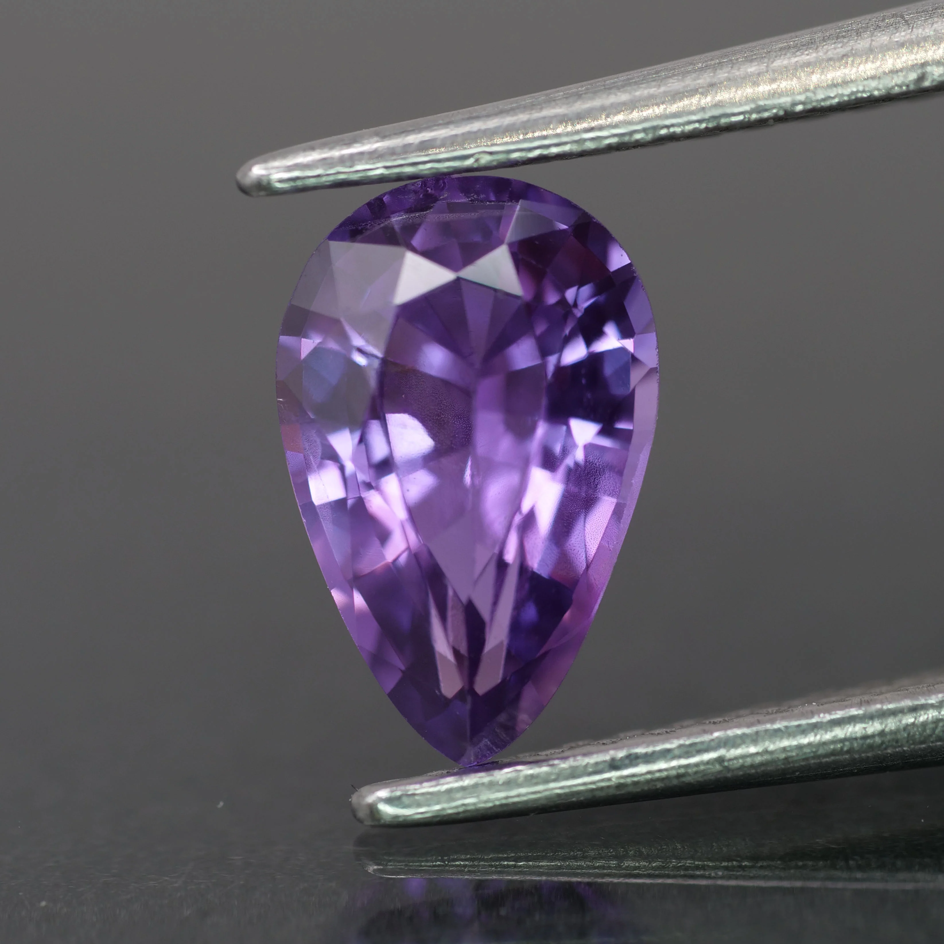 Sapphire | natural, violet color, pear-cut, *8.5x5.5mm, 1.2ct