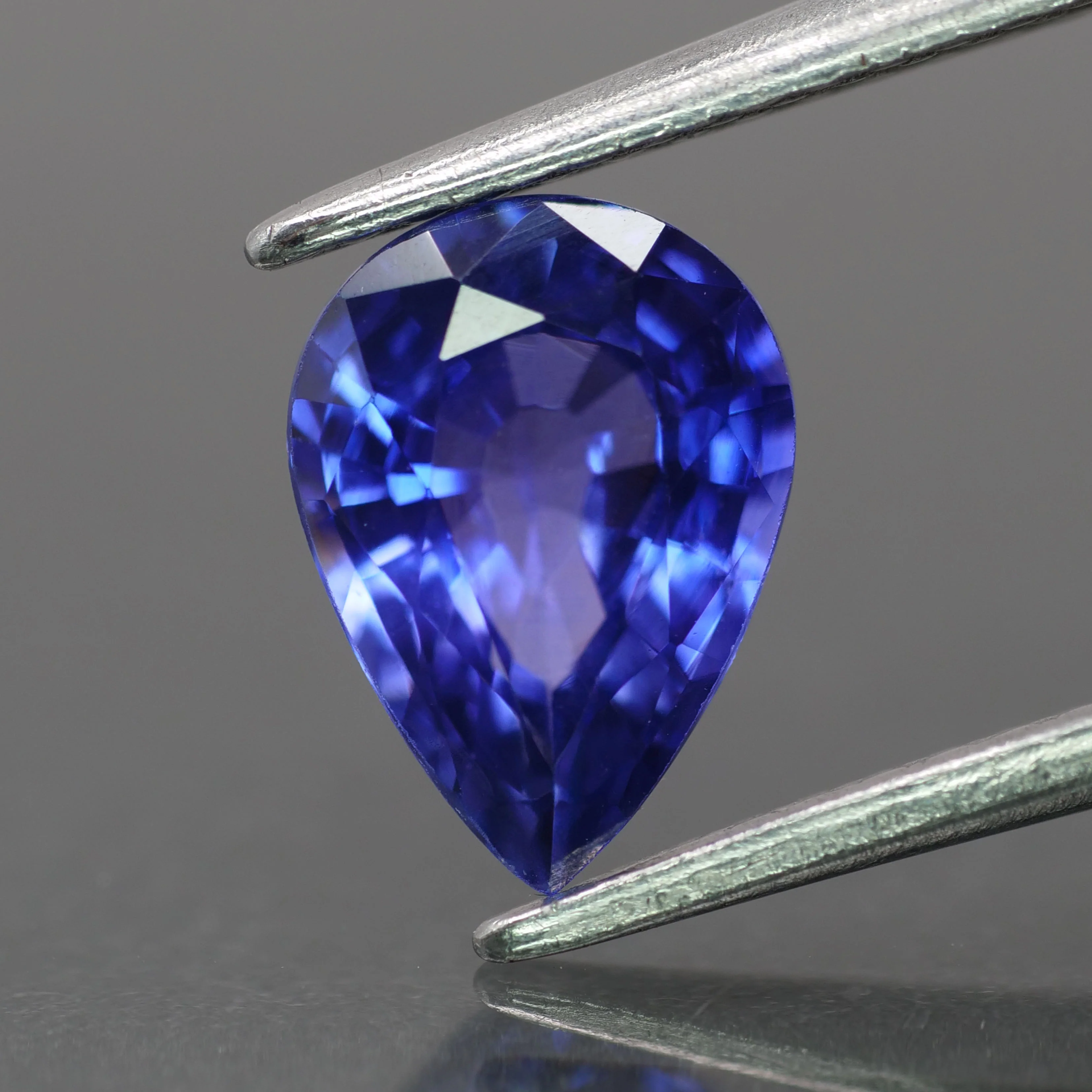 Sapphire | natural, bluish purple color, pear-cut, 8x6mm, 1.3ct