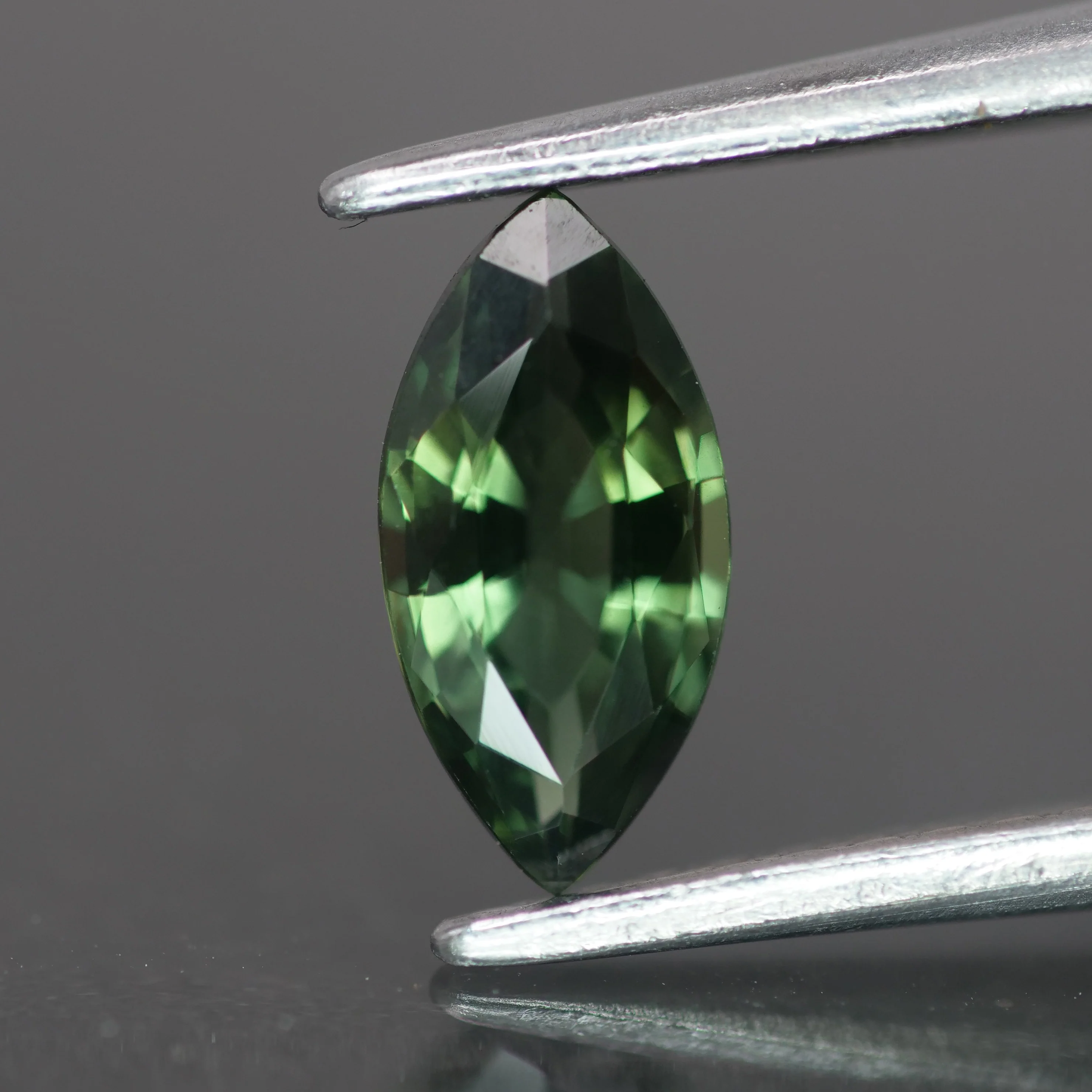 Sapphire | natural, teal color/color changing, marquise-cut, 8x4mm, 0.6 ct