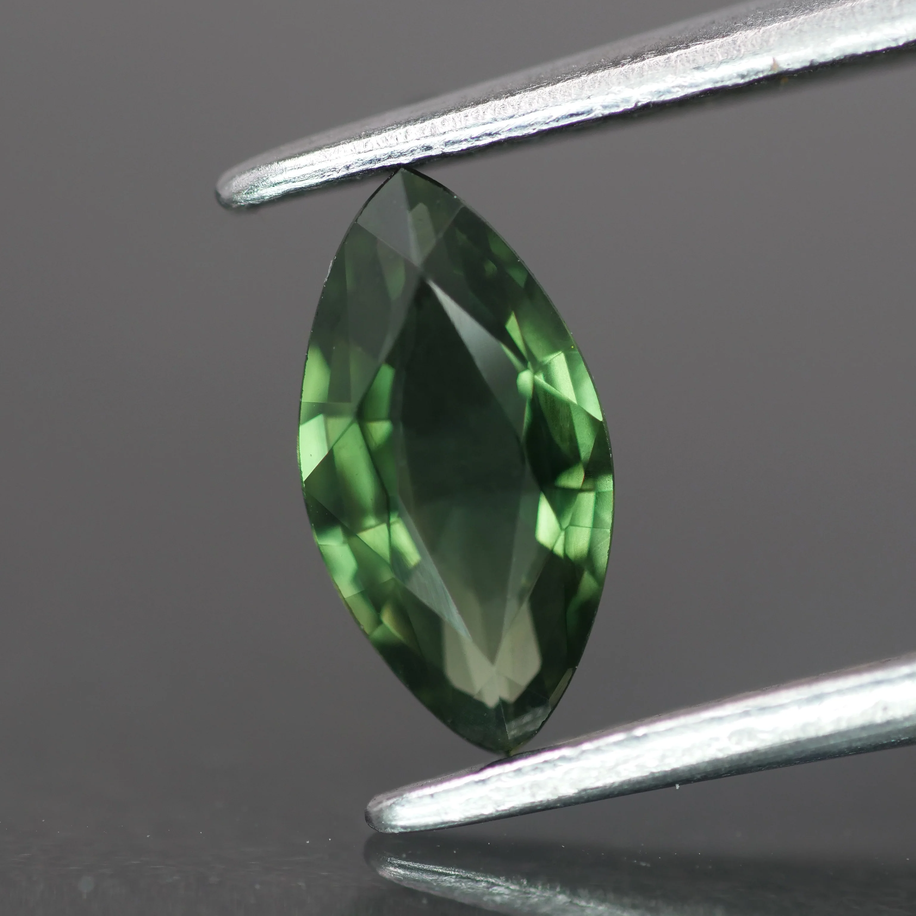 Sapphire | natural, teal color/color changing, marquise-cut, 8x4mm, 0.6 ct - Image 2