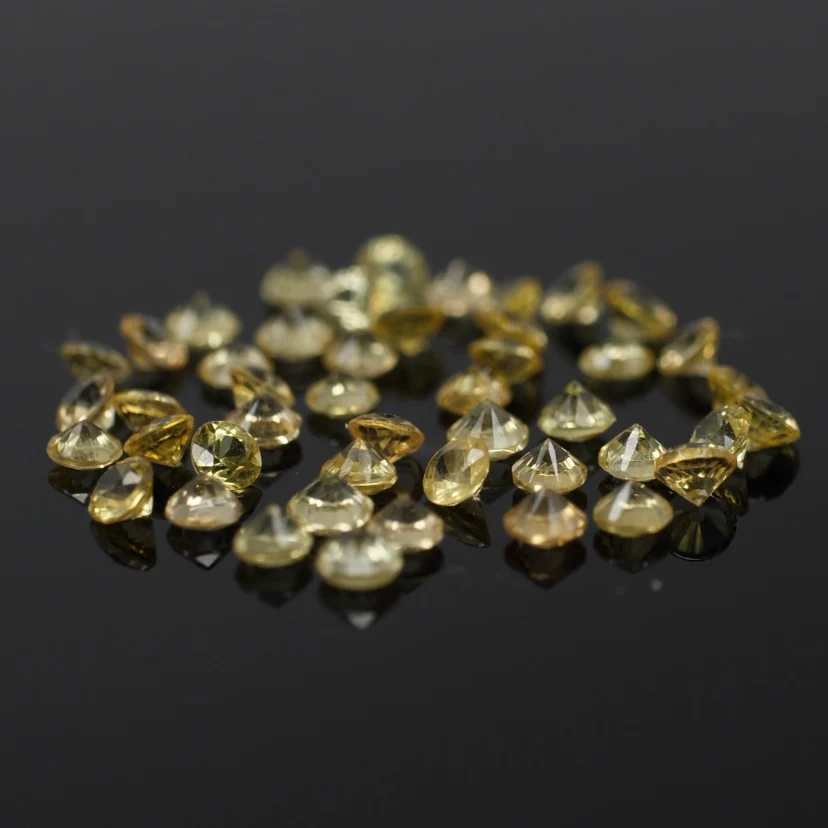 Sapphire | natural, yellow color, round-cut, accent stones