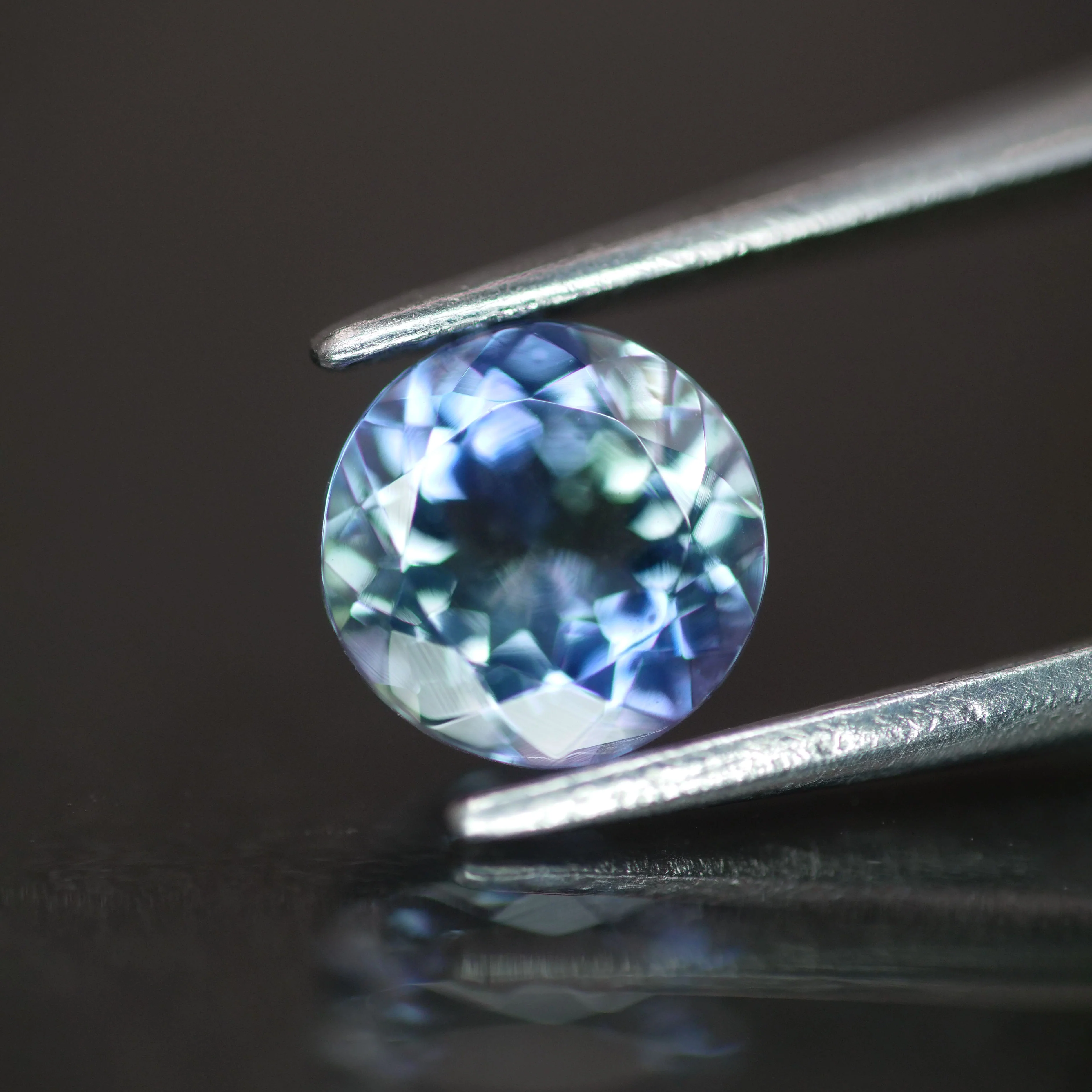 Tanzanite | natural, multi-color: green, blue & purple, round-cut, 6mm, 0.75ct