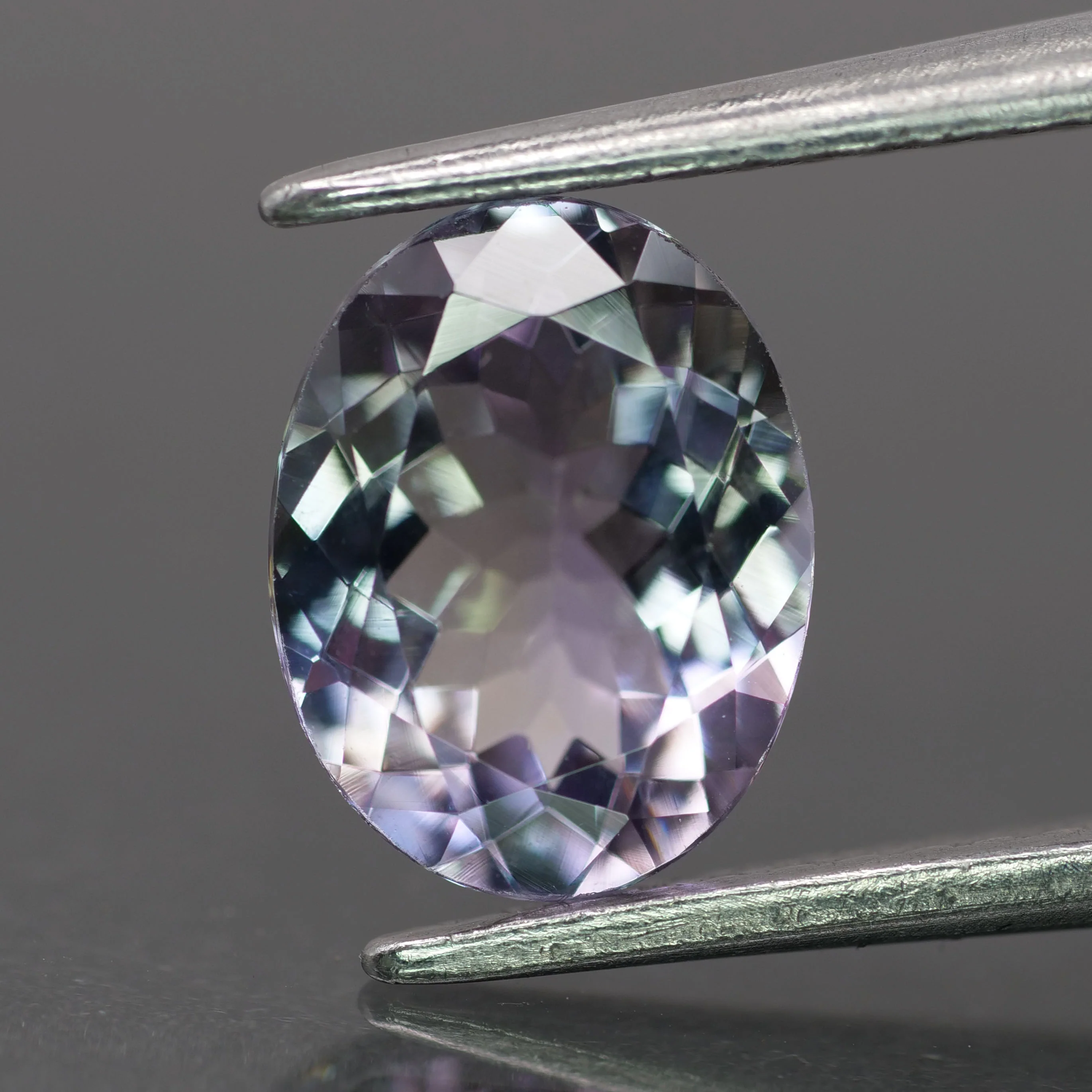 Tanzanite | natural, greenish lavender color, oval-cut, *8x6mm, 1.4ct