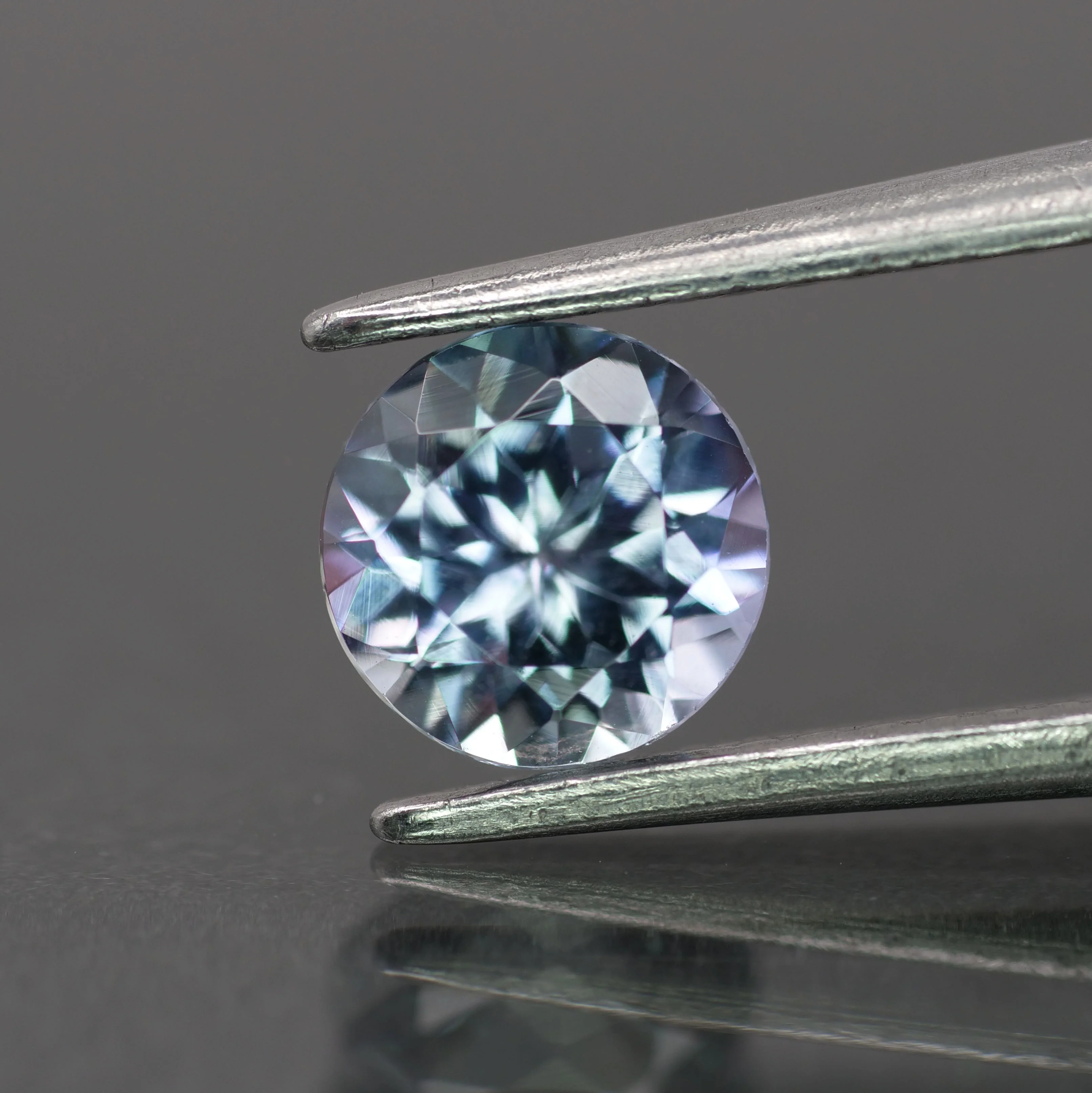 Tanzanite | natural, multi-color: green, blue & purple, round-cut, *6mm, 0.8ct