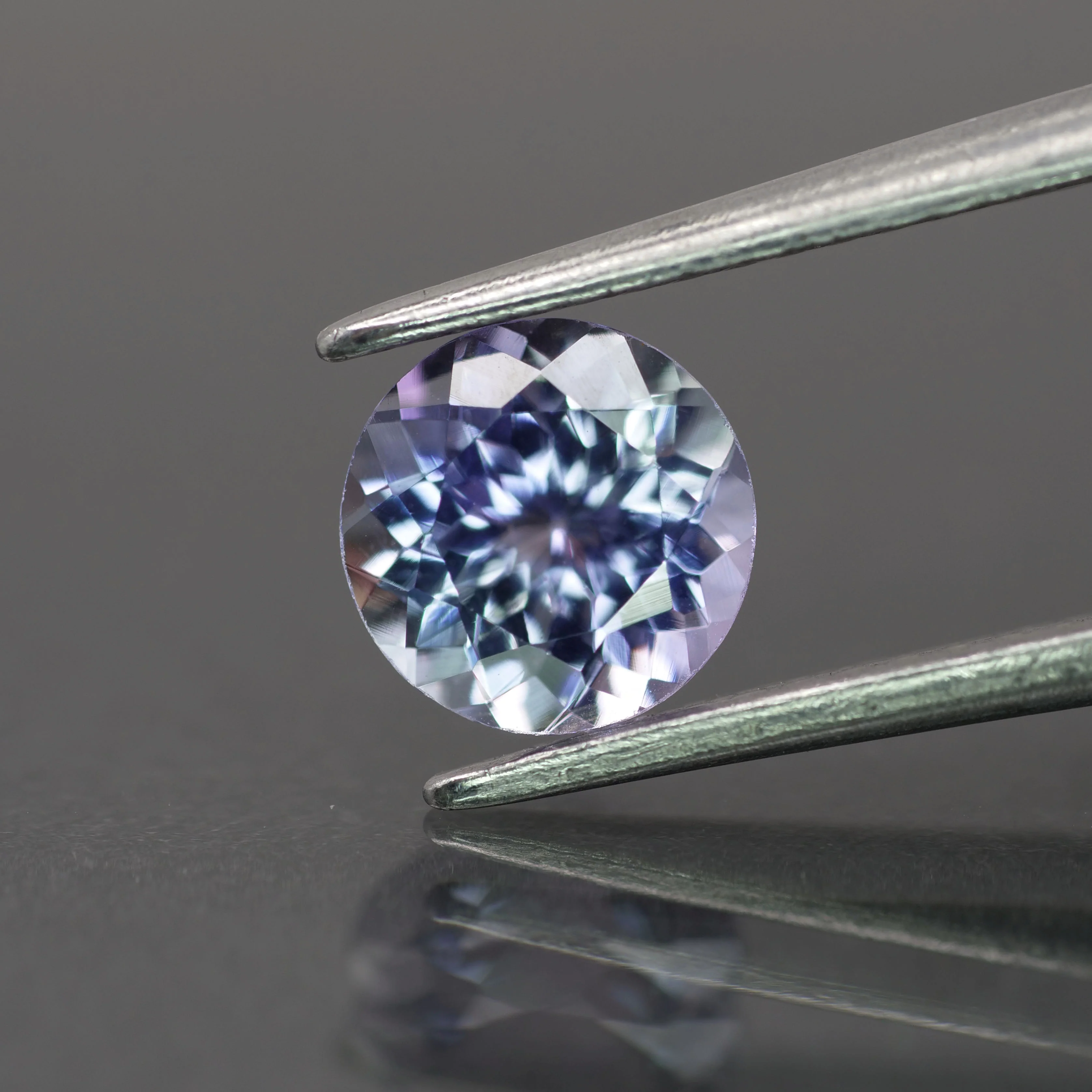 Tanzanite | natural, bluish purple color, round-cut, *6.5mm, 1ct