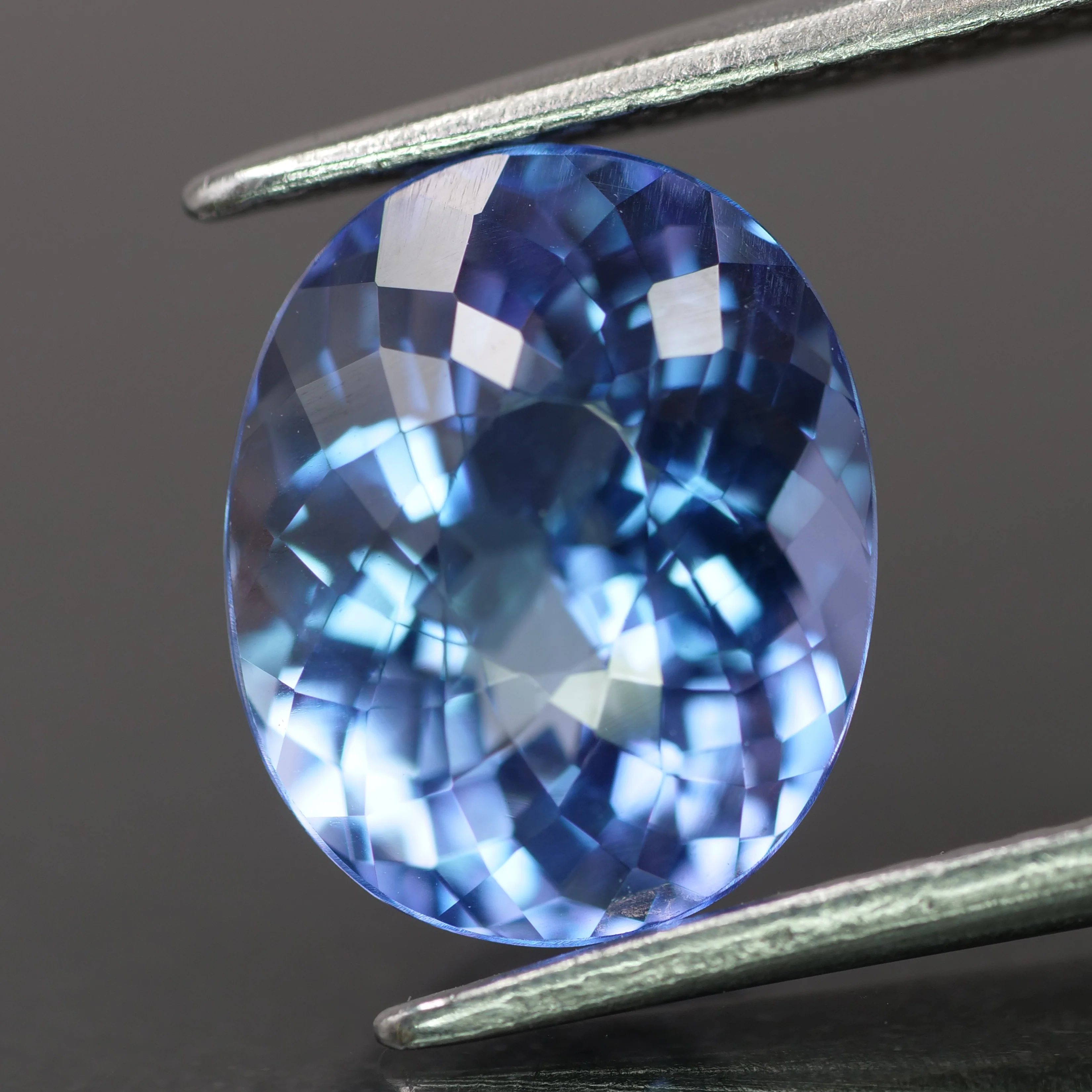 Tanzanite | natural, purplish blue color, oval-cut, 10x8mm, 3.1ct